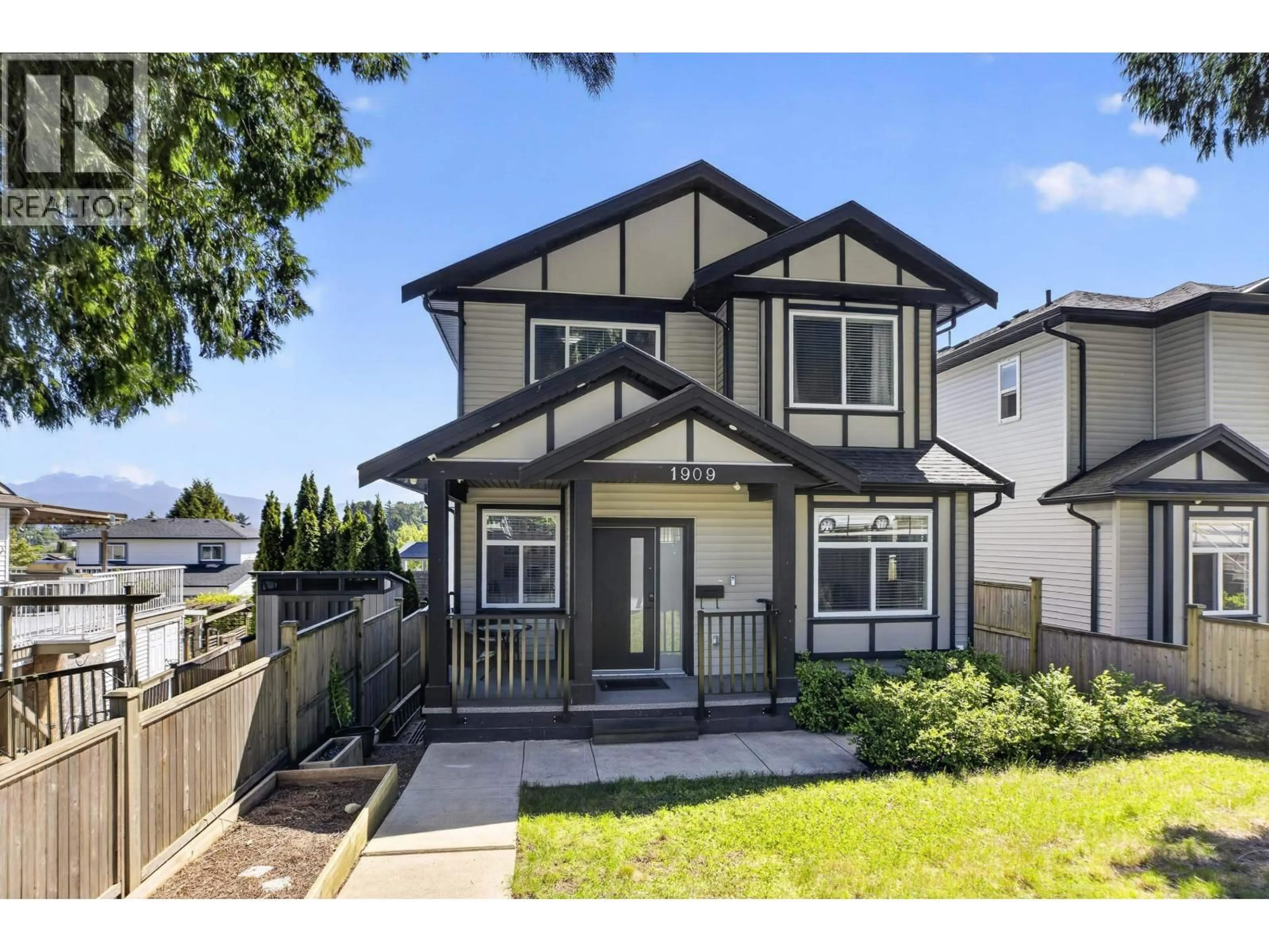 Home with vinyl exterior material, street for 1909 PITT RIVER ROAD, Port Coquitlam British Columbia V3C1R2