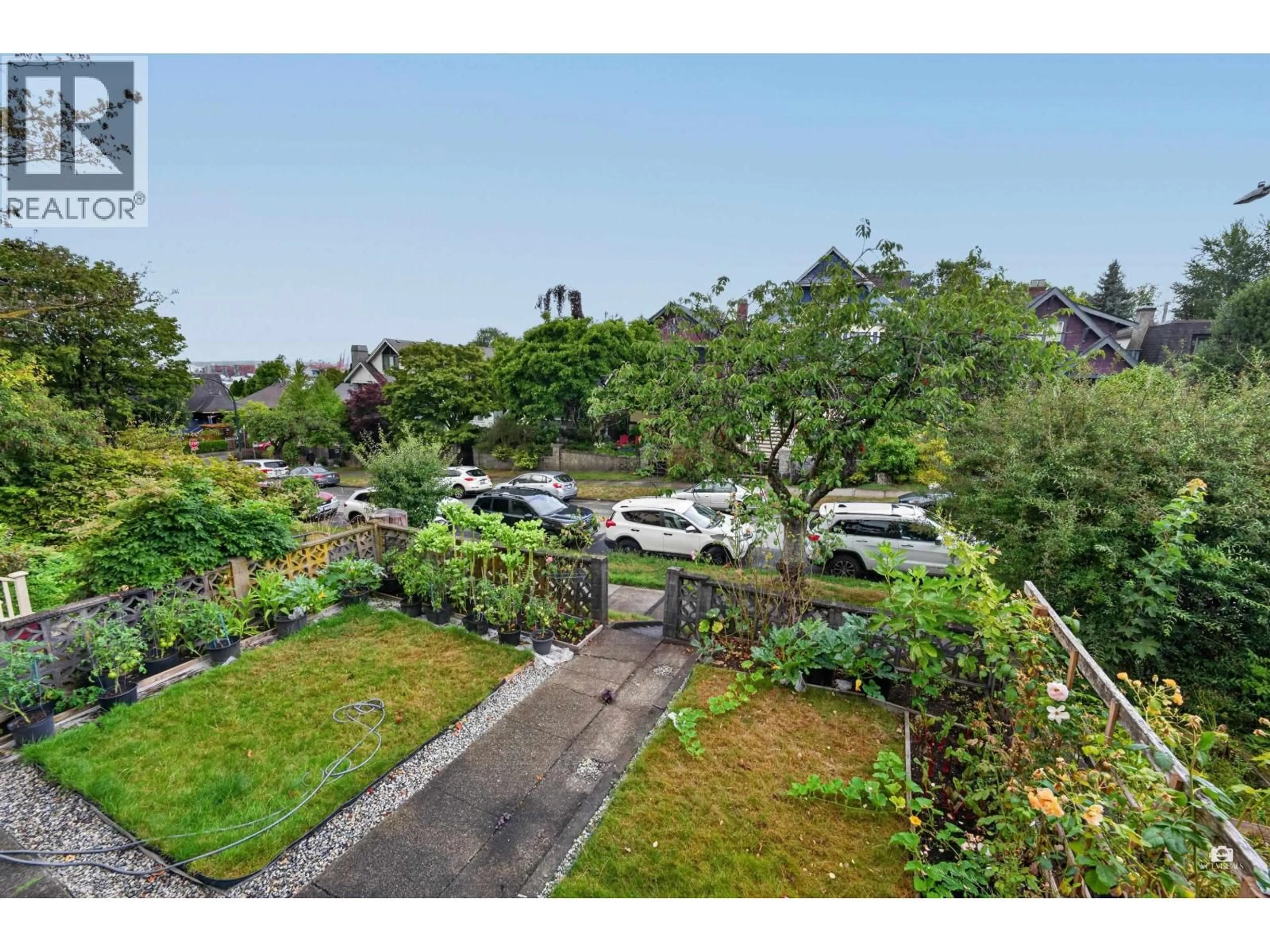 A pic from outside/outdoor area/front of a property/back of a property/a pic from drone, street for 1828 PARKER STREET, Vancouver British Columbia V5L2K9