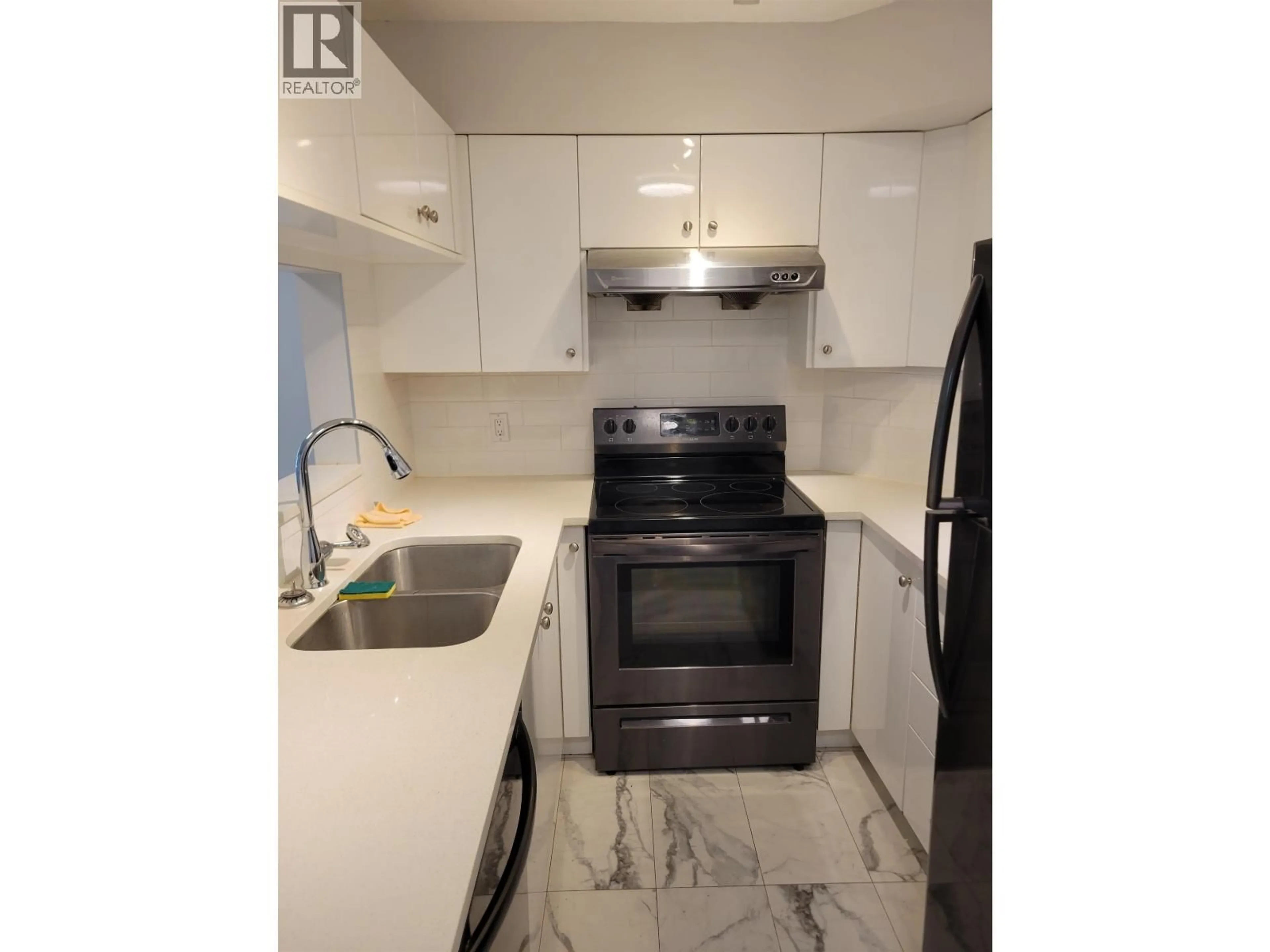 Standard kitchen, ceramic/tile floor for 209 - 3455 ASCOT PLACE, Vancouver British Columbia V5R6B7