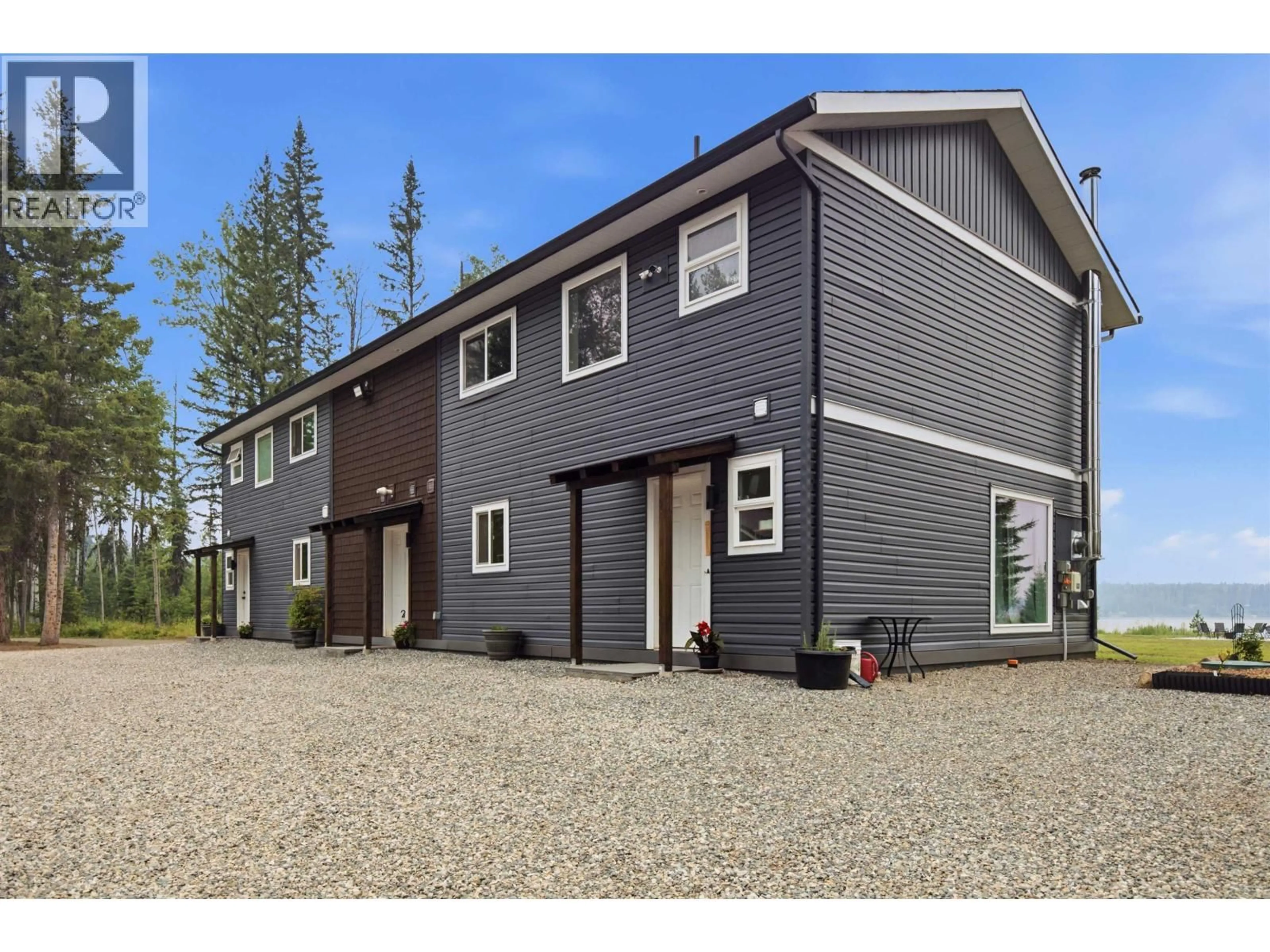 Home with vinyl exterior material, street for 3845 ALLPRESS ROAD, 150 Mile House British Columbia V0K2G0