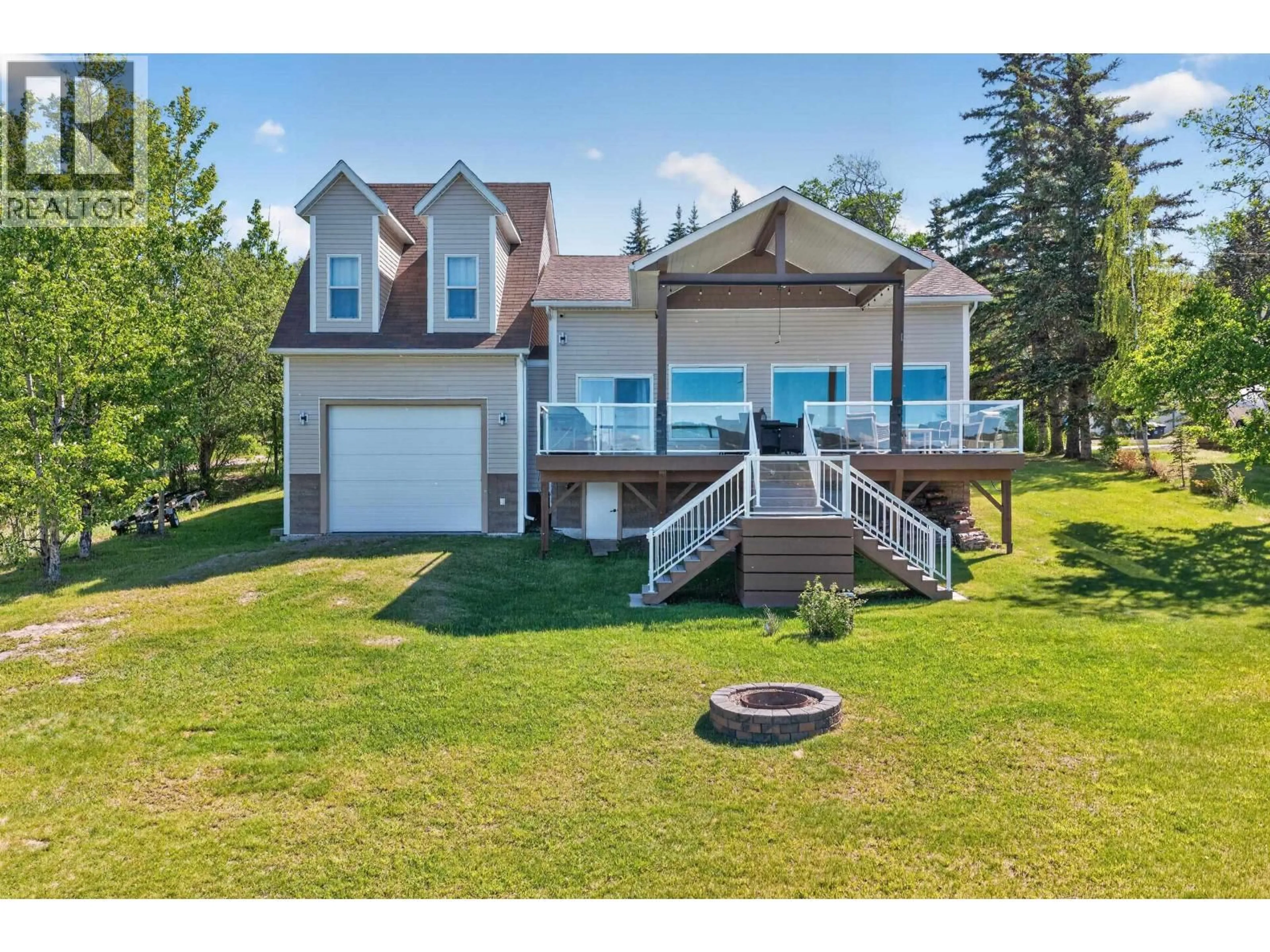 A pic from outside/outdoor area/front of a property/back of a property/a pic from drone, water/lake/river/ocean view for 13239 PARADISE STREET, Fort St. John British Columbia V0C1H0