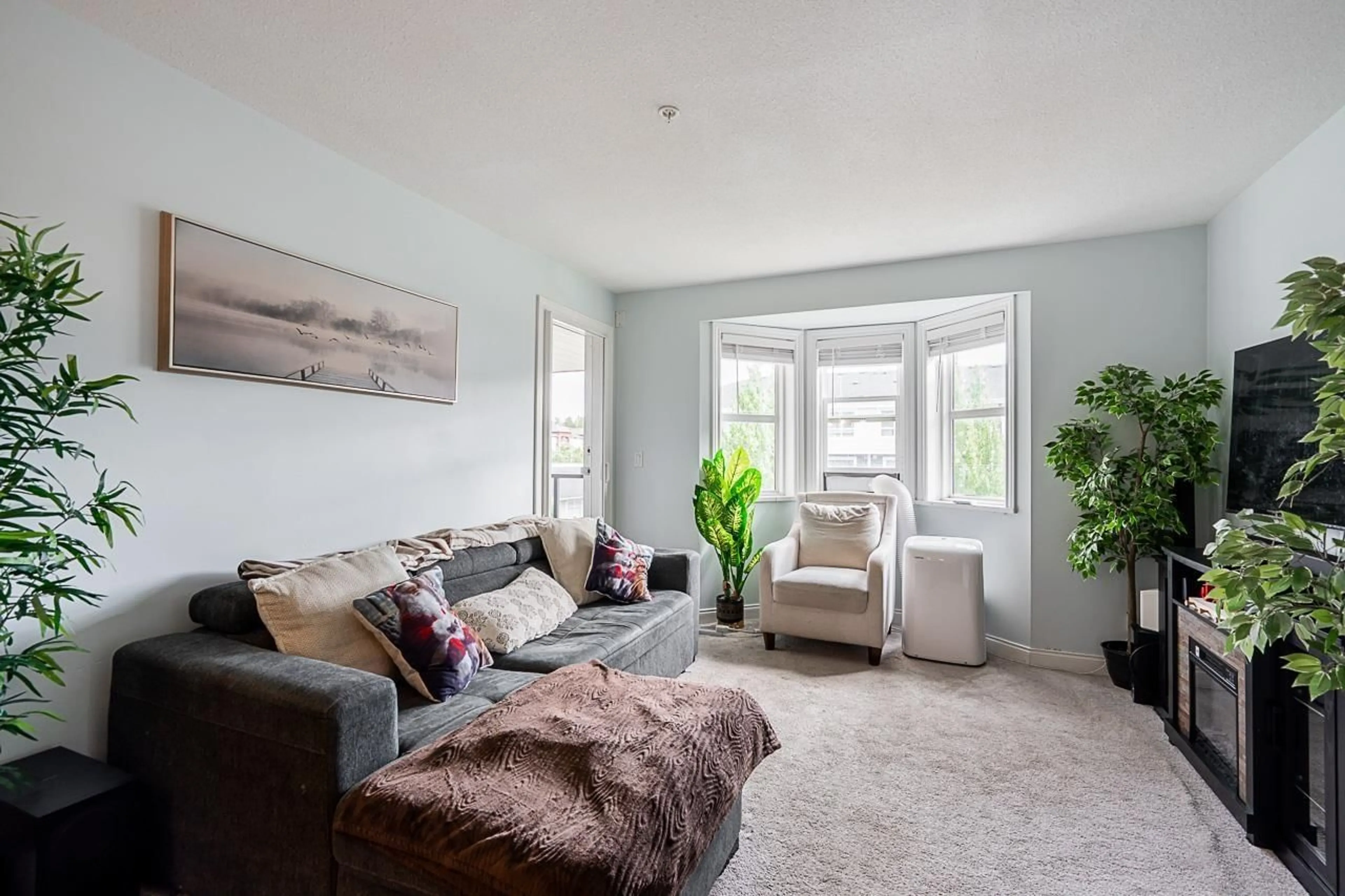 Living room with furniture, unknown for 206 - 19774 56 AVENUE, Langley British Columbia V3A3X6