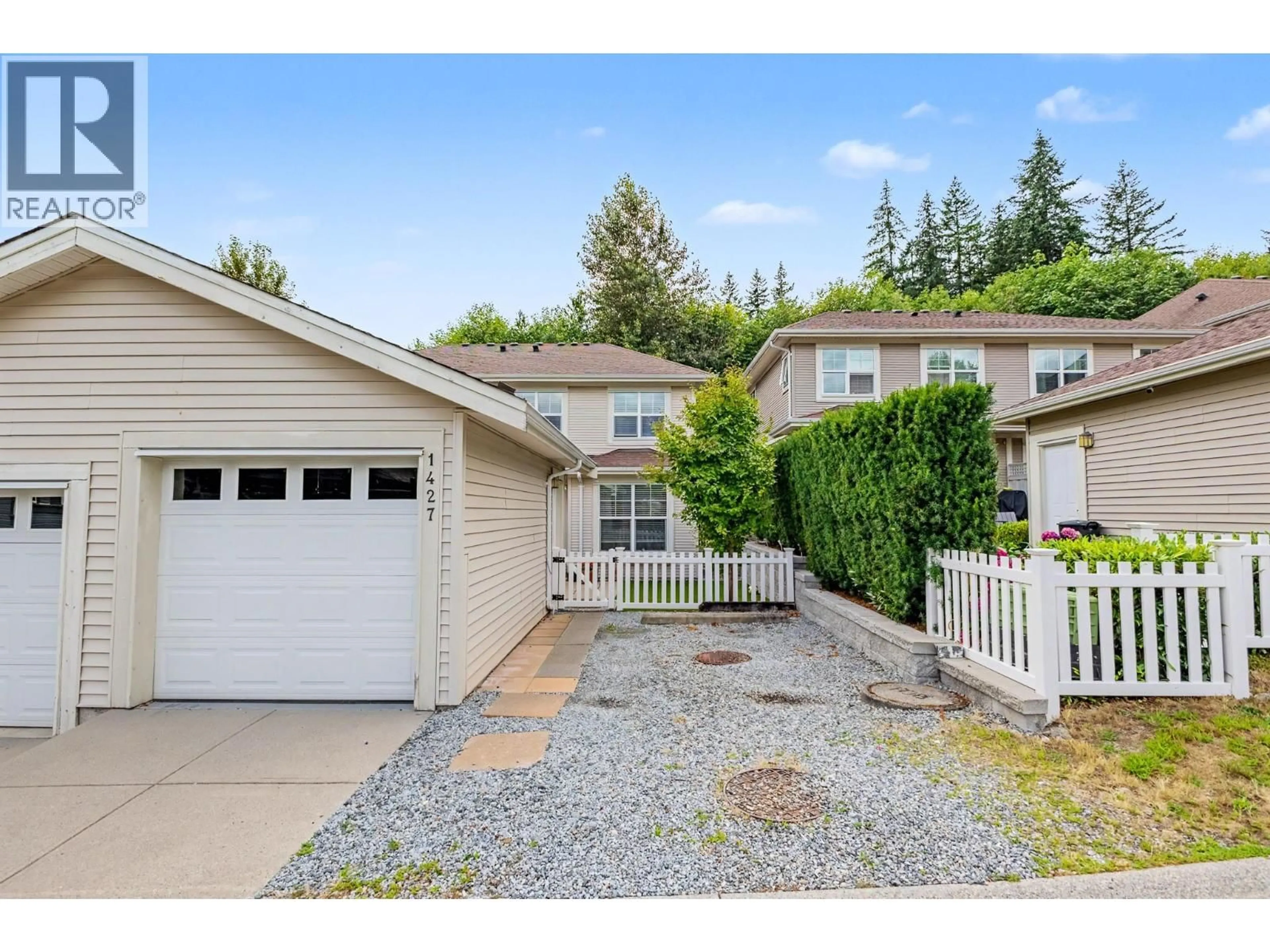 Home with vinyl exterior material, street for 1427 COLLINS ROAD, Coquitlam British Columbia V3E0A9