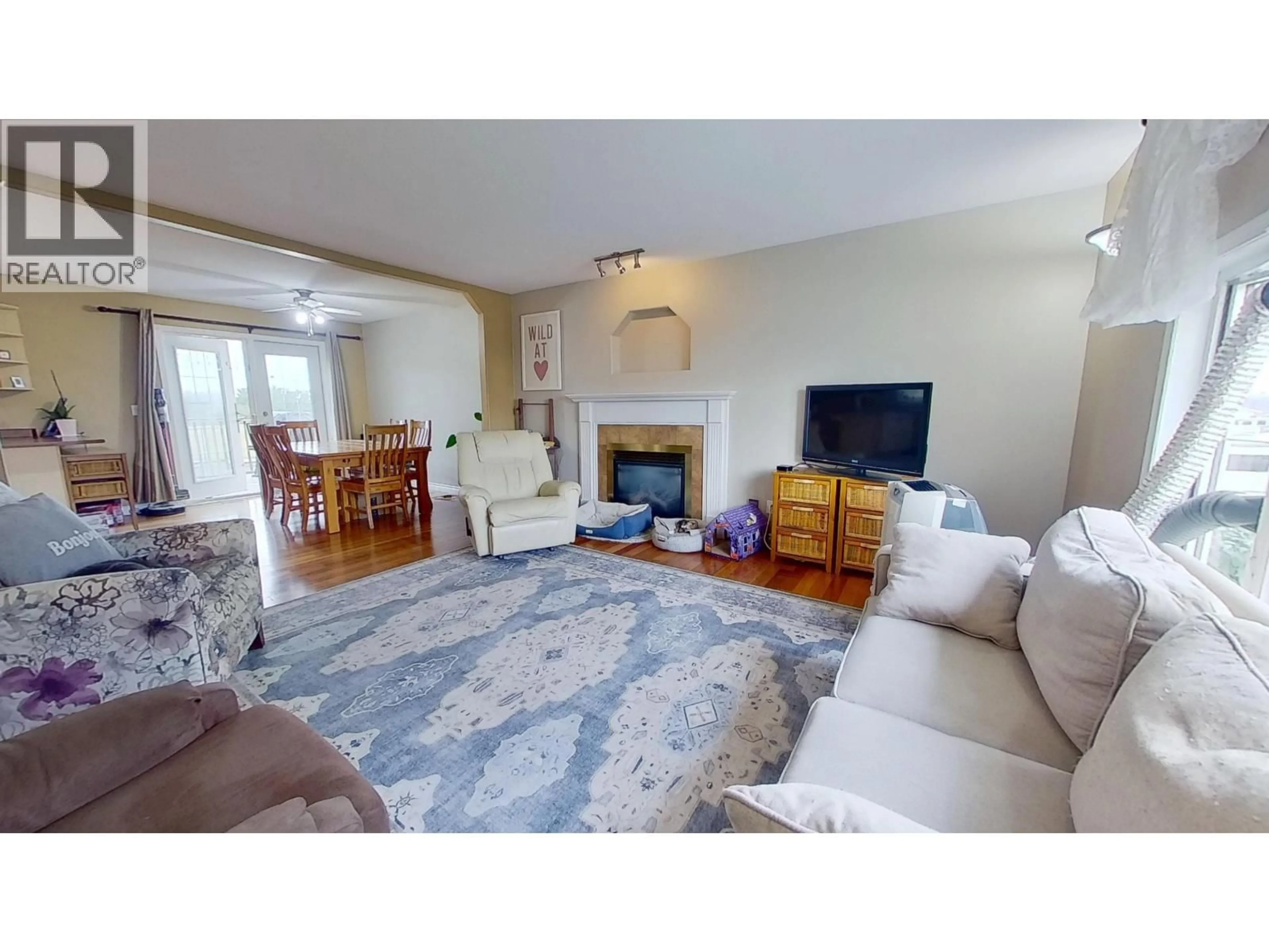 Living room with furniture, unknown for 8903 96A AVENUE, Fort St. John British Columbia V1J0A3