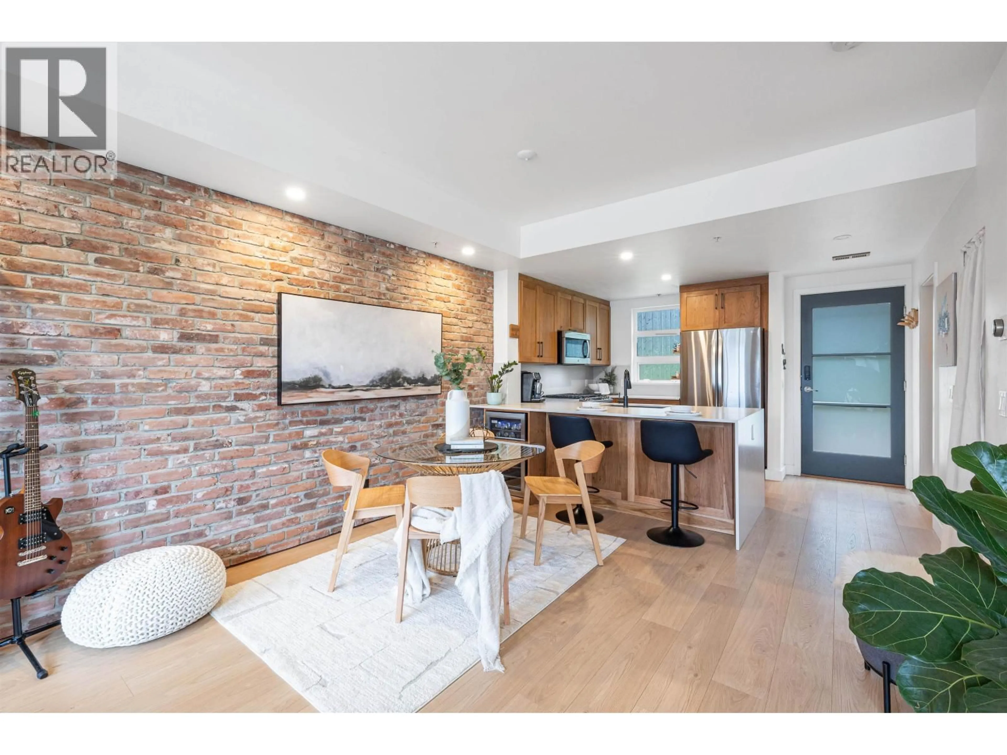Open concept kitchen, ceramic/tile floor for 323 - 95 MOODY STREET, Port Moody British Columbia V3H0H2