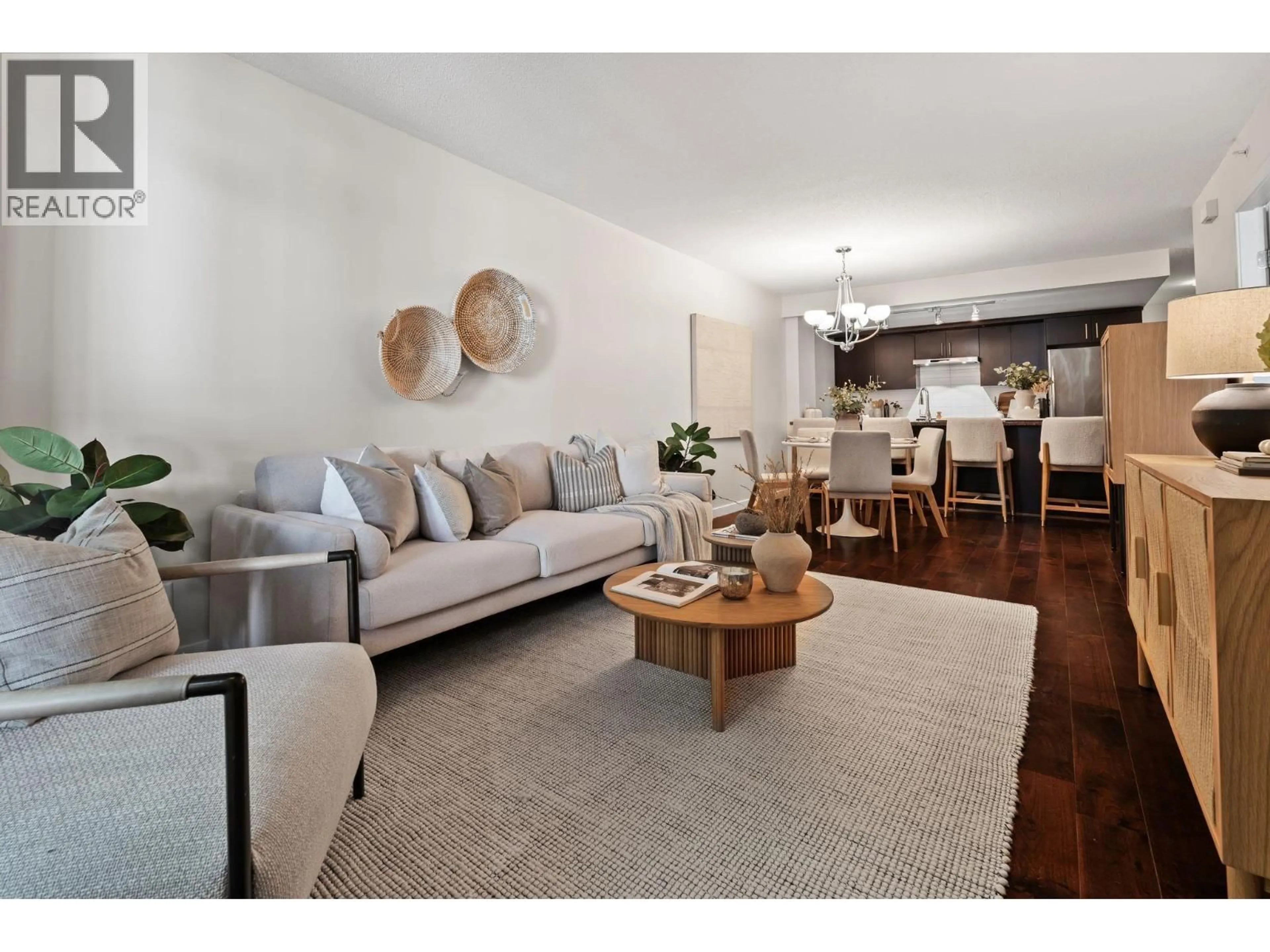 Living room with furniture, wood/laminate floor for 1648 7TH AVENUE, Vancouver British Columbia V6J1S5