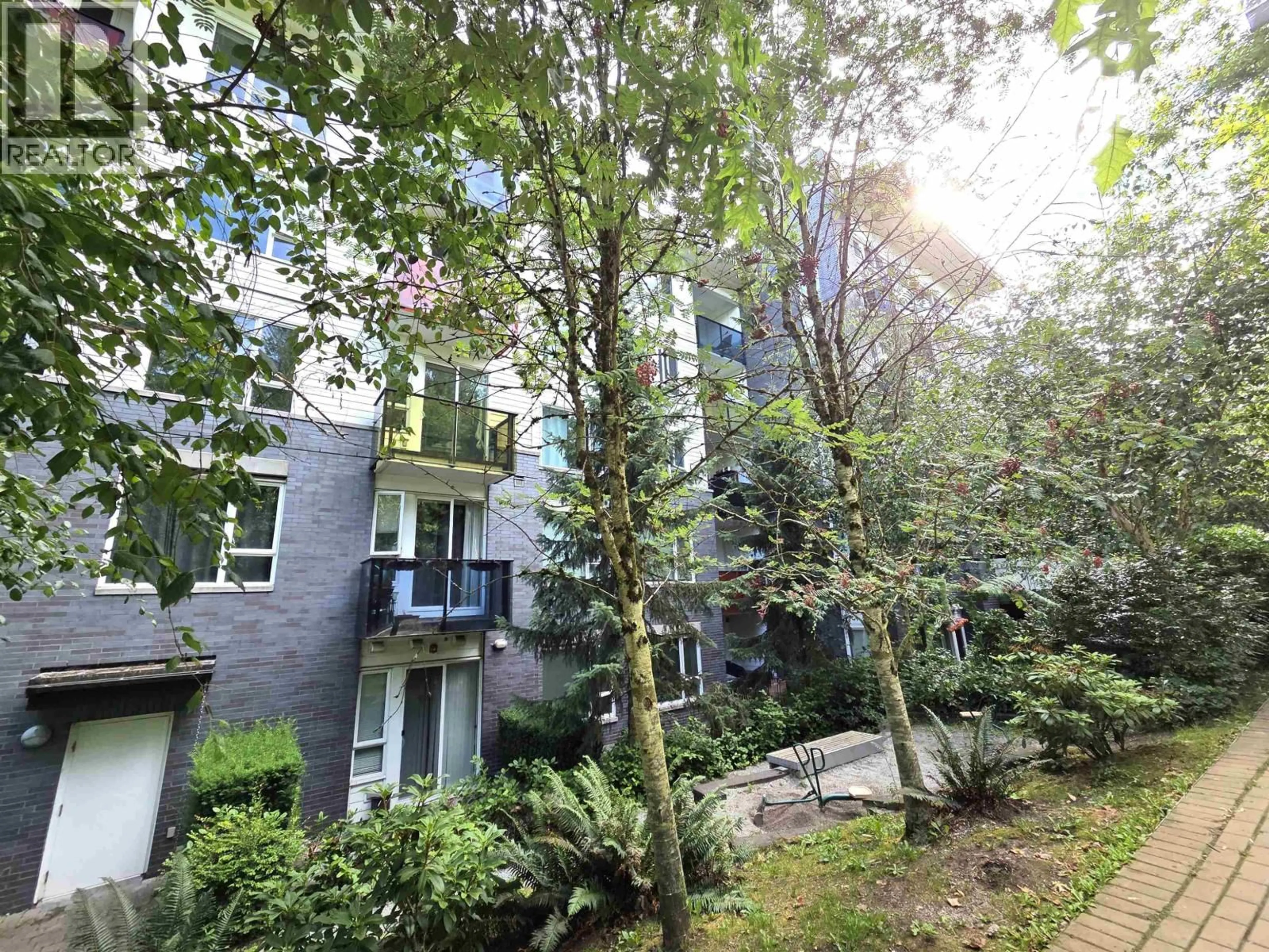 A pic from outside/outdoor area/front of a property/back of a property/a pic from drone, forest/trees view for 111 - 9250 UNIVERSITY HIGH STREET, Burnaby British Columbia V5A0B3