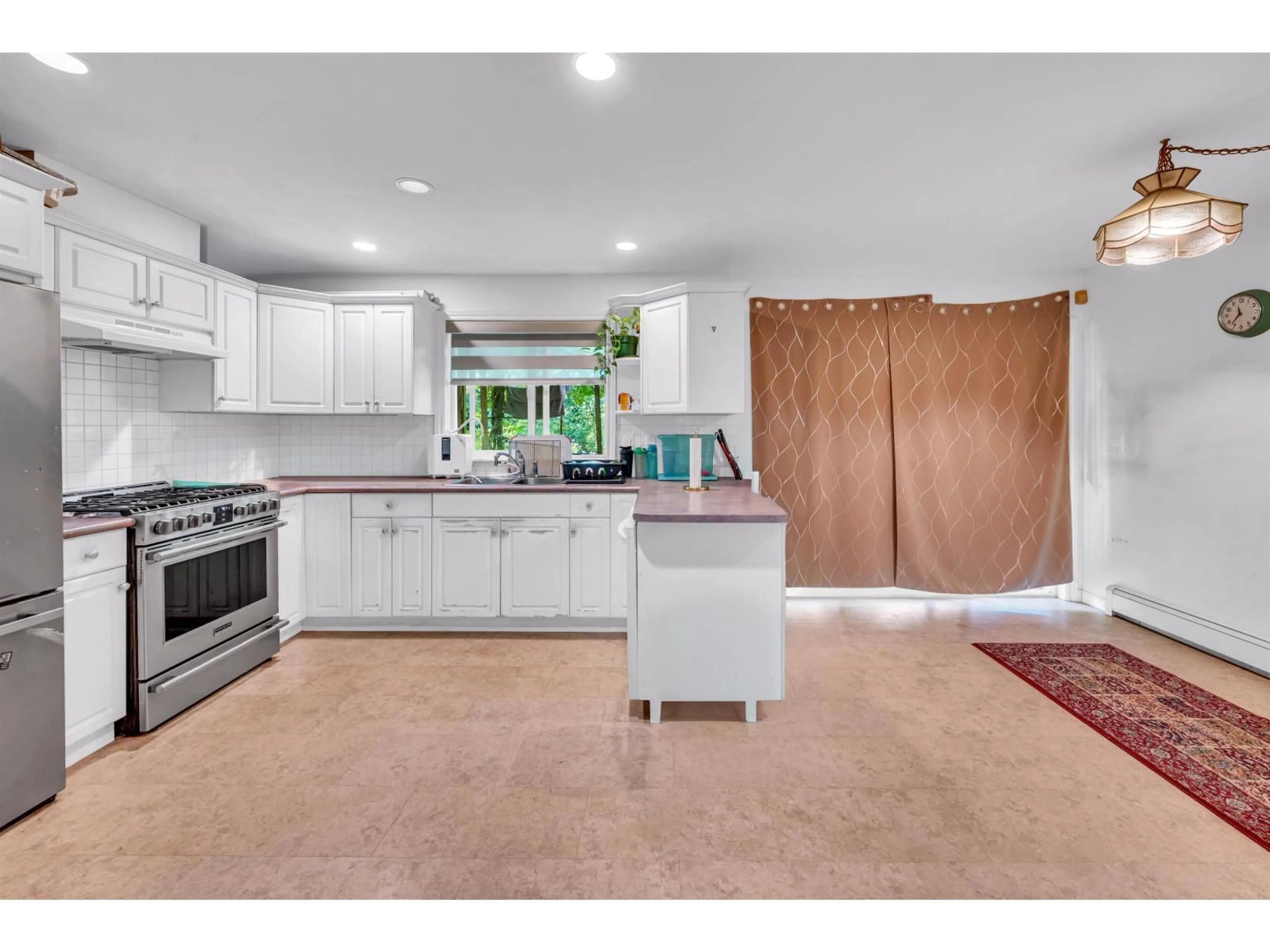 Open concept kitchen, ceramic/tile floor for 18136 CLAYTONWOOD CRESCENT, Surrey British Columbia V3S7T5