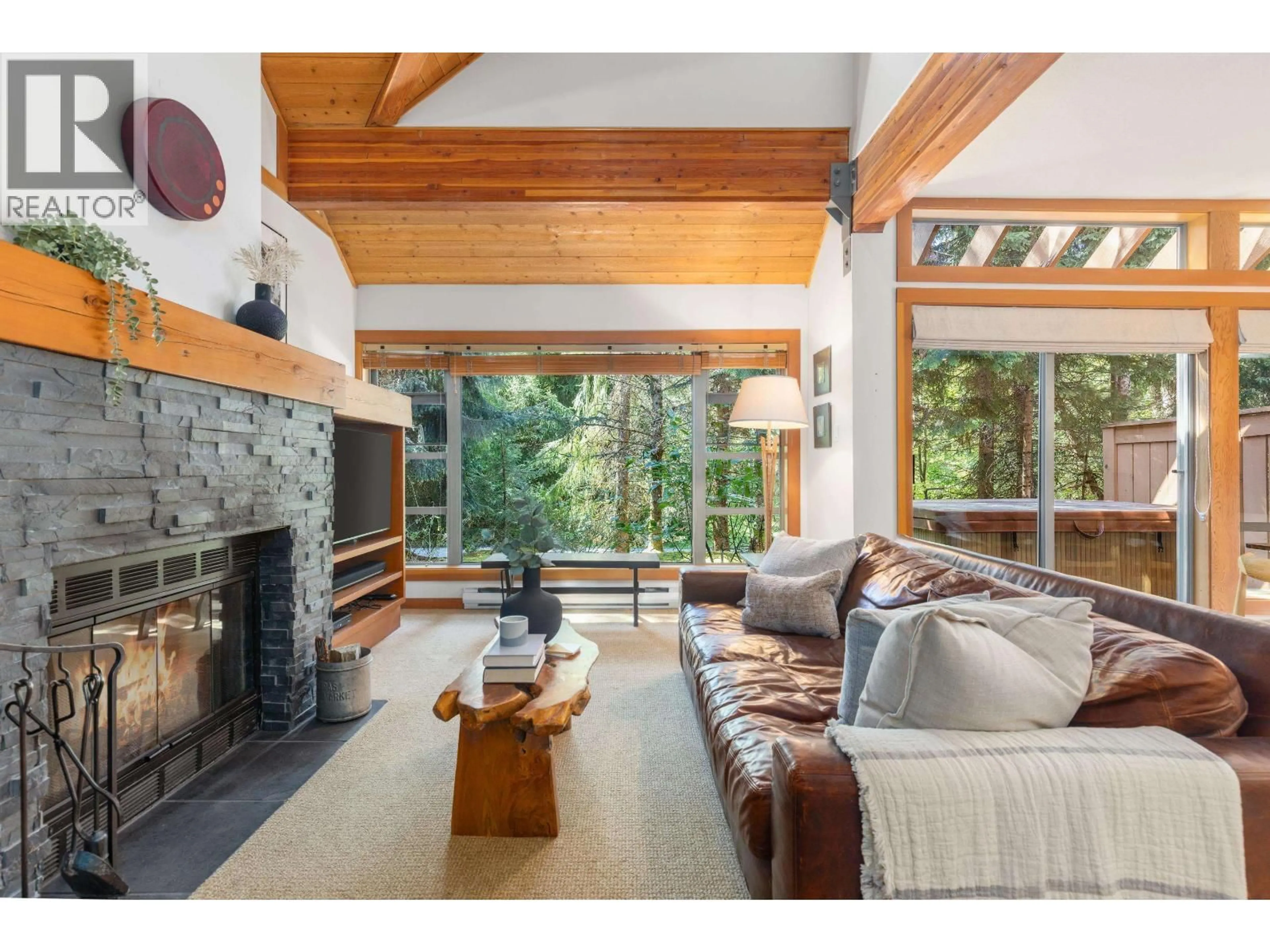Living room with furniture, wood/laminate floor for 4603 MONTEBELLO PLACE, Whistler British Columbia V8E0Z4
