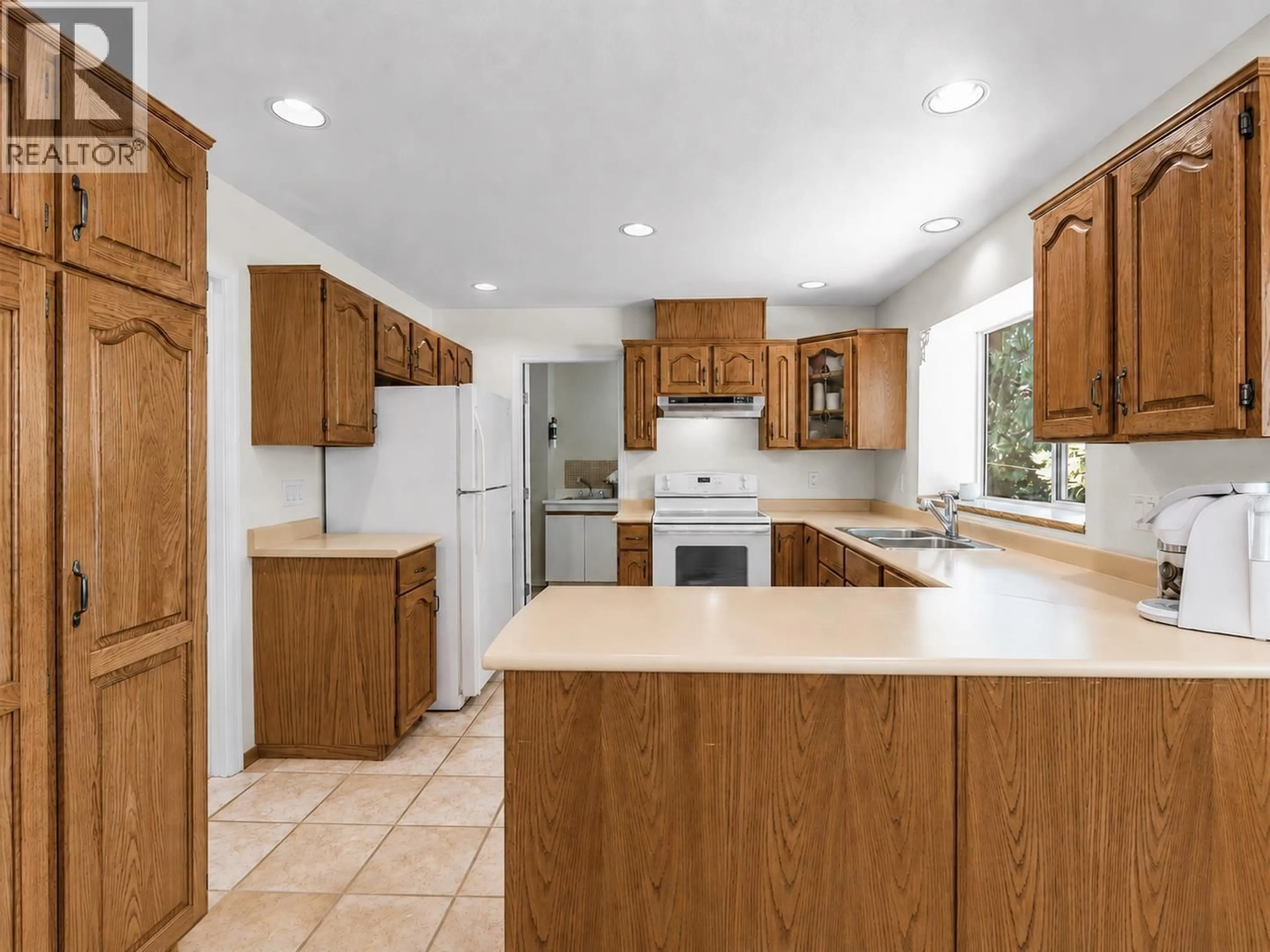 Open concept kitchen, ceramic/tile floor for 3 CHEVALIER COURT, Port Moody British Columbia V3H4L3