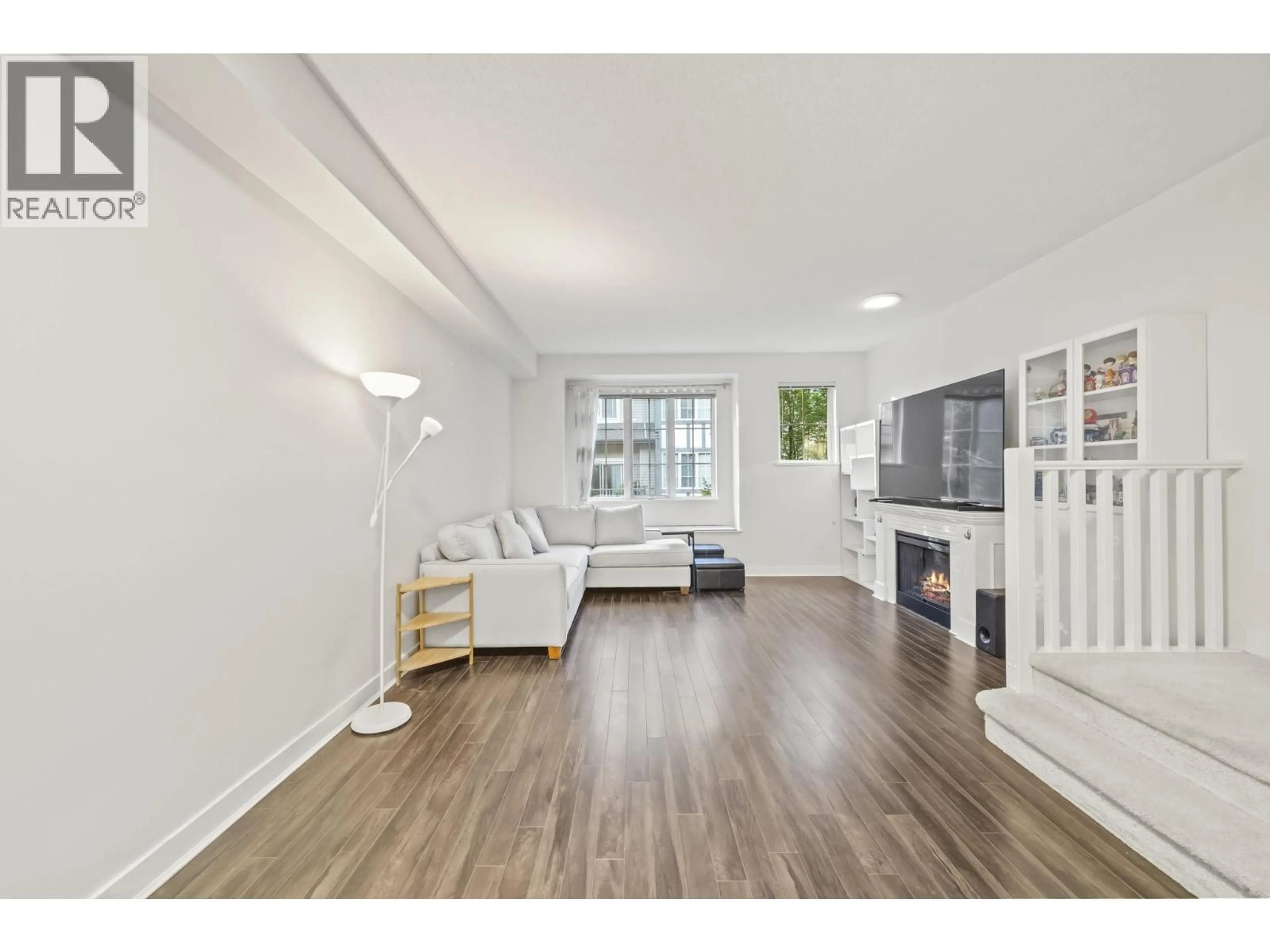 Living room with furniture, wood/laminate floor for 30 - 8533 CUMBERLAND PLACE, Burnaby British Columbia V3N5C1