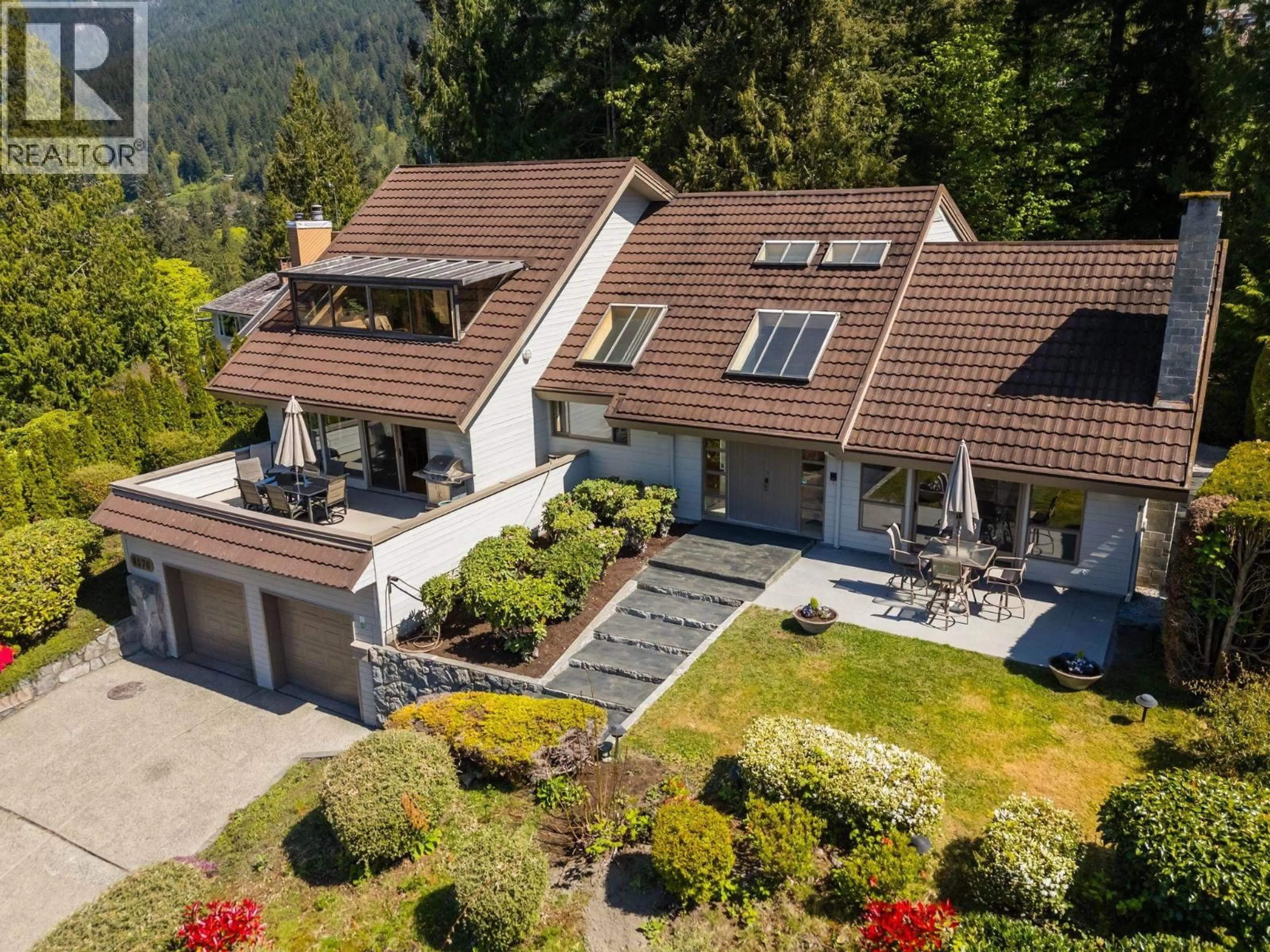 A pic from outside/outdoor area/front of a property/back of a property/a pic from drone, mountain view for 8570 ANSELL PLACE, West Vancouver British Columbia V7W2W3