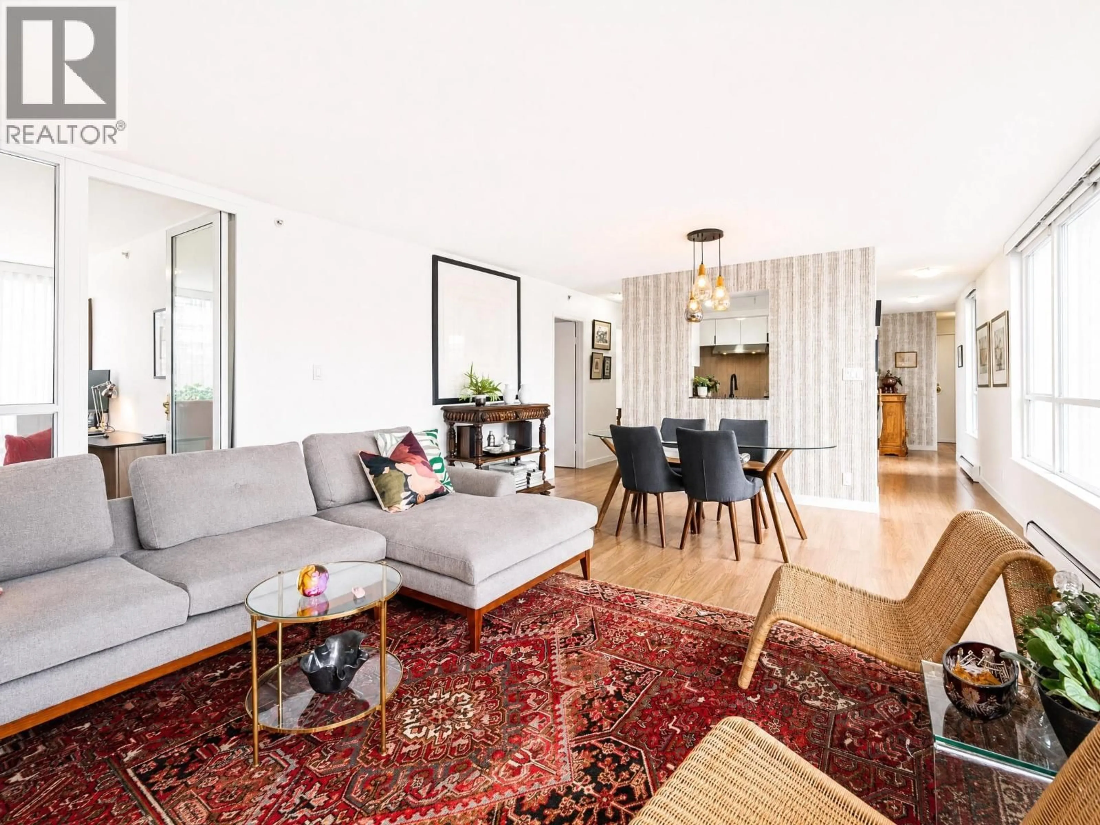 Living room with furniture, unknown for 302 - 1228 MARINASIDE CRESCENT, Vancouver British Columbia V6Z2W4