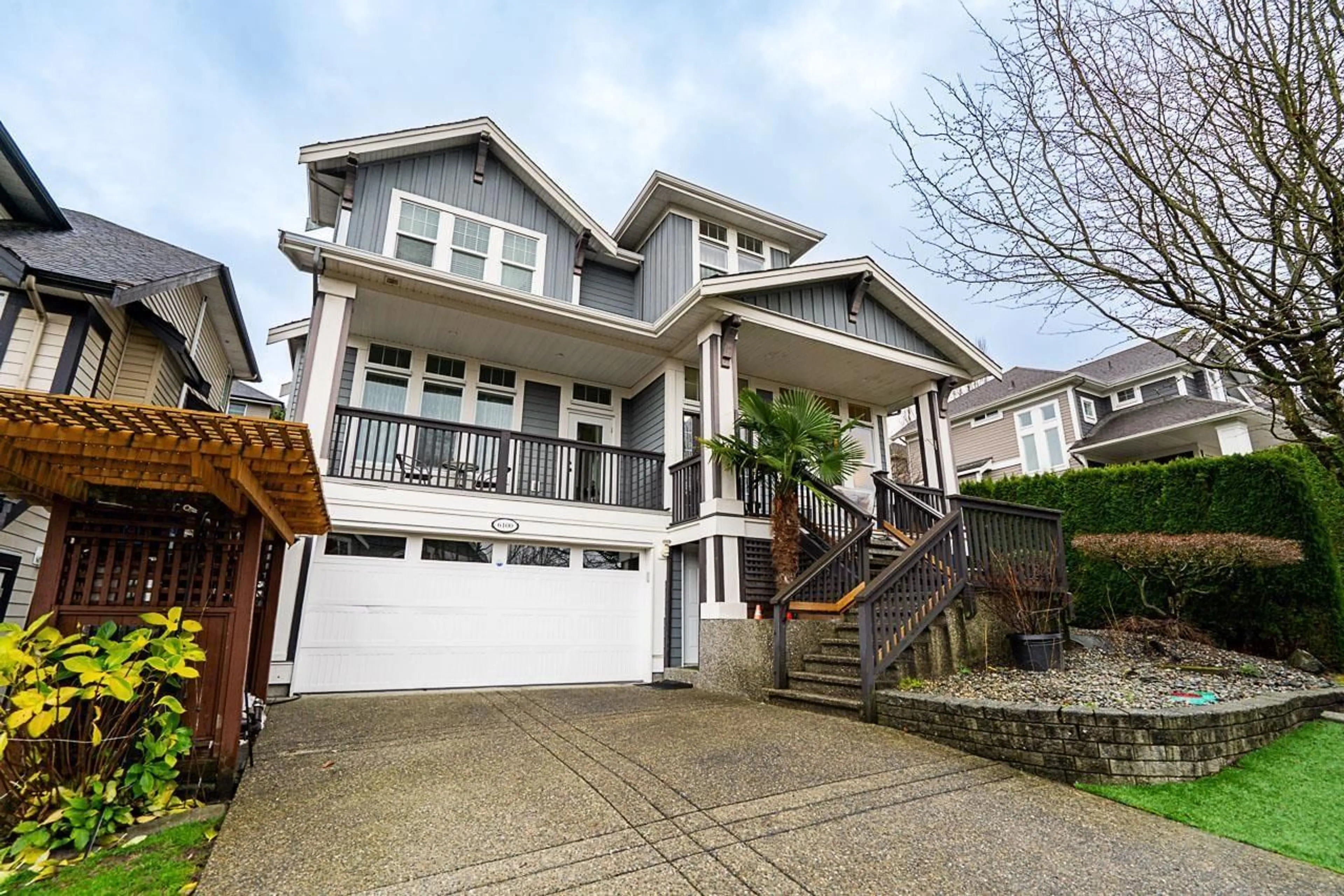 Home with vinyl exterior material, street for 6100 163B STREET, Surrey British Columbia V3S3W2