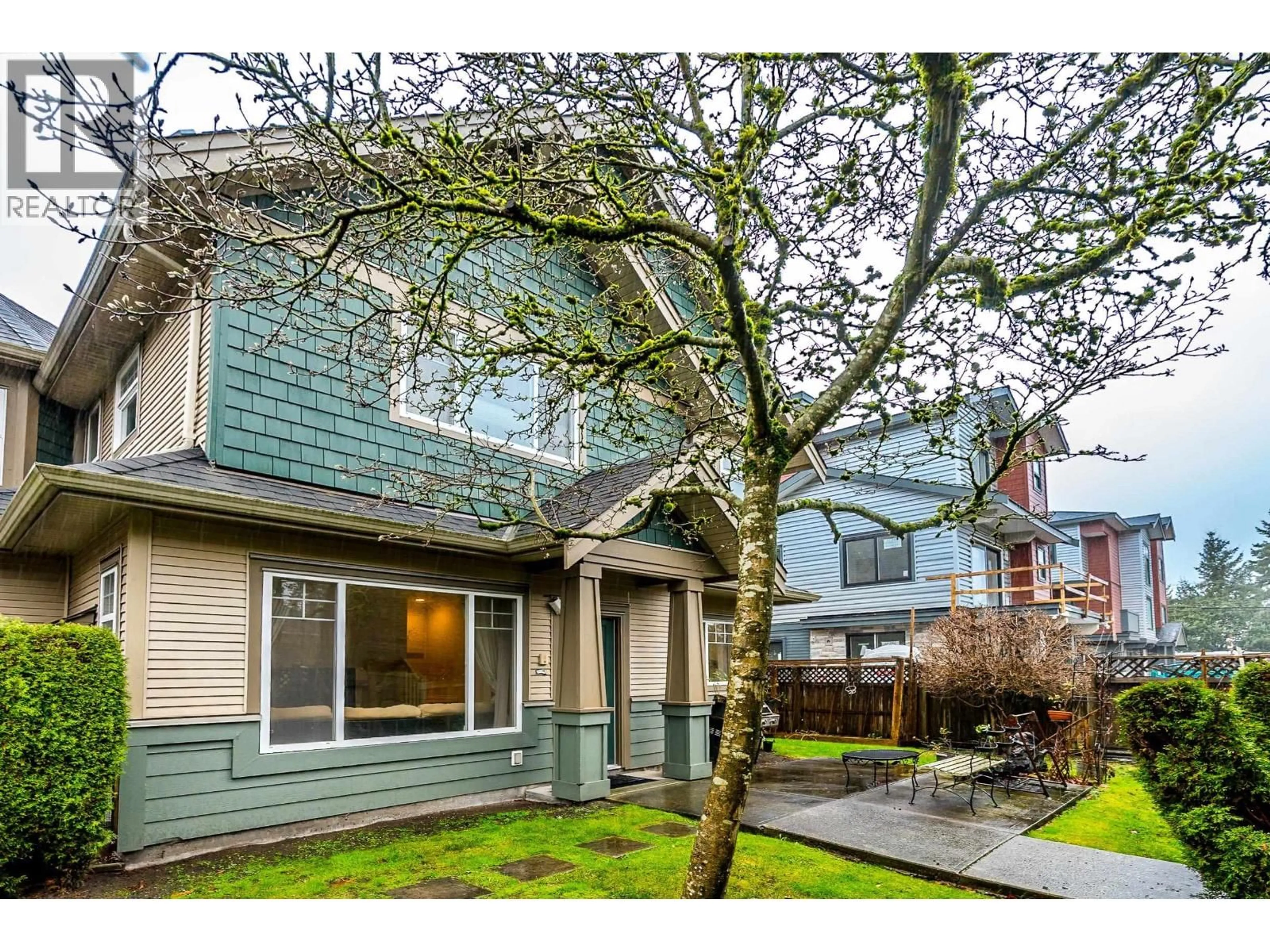 Home with vinyl exterior material, street for 10 - 7060 BRIDGE STREET, Richmond British Columbia V6Y2S7