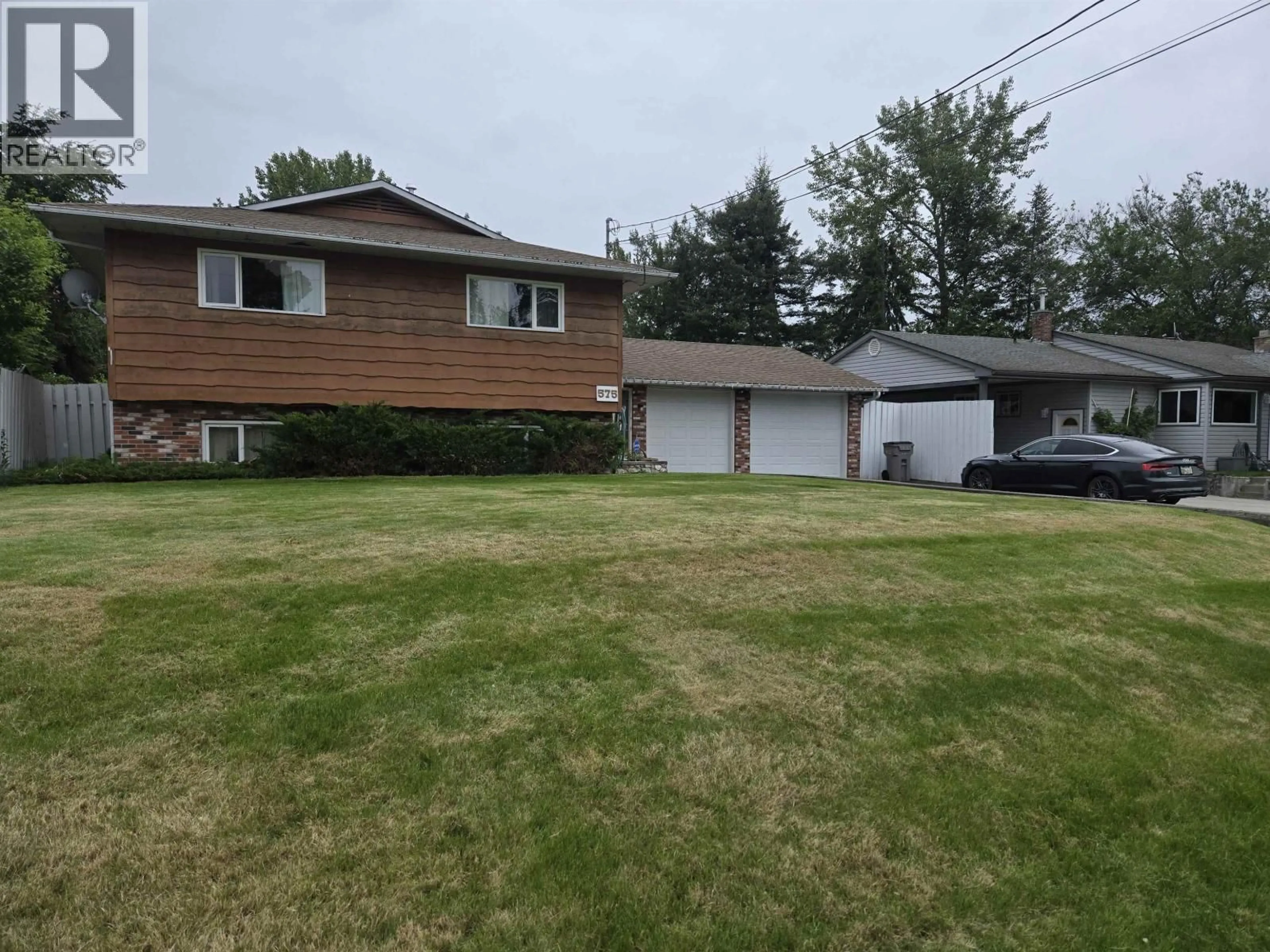 A pic from outside/outdoor area/front of a property/back of a property/a pic from drone, street for 575 HARCOURT AVENUE, Quesnel British Columbia V2J1S2