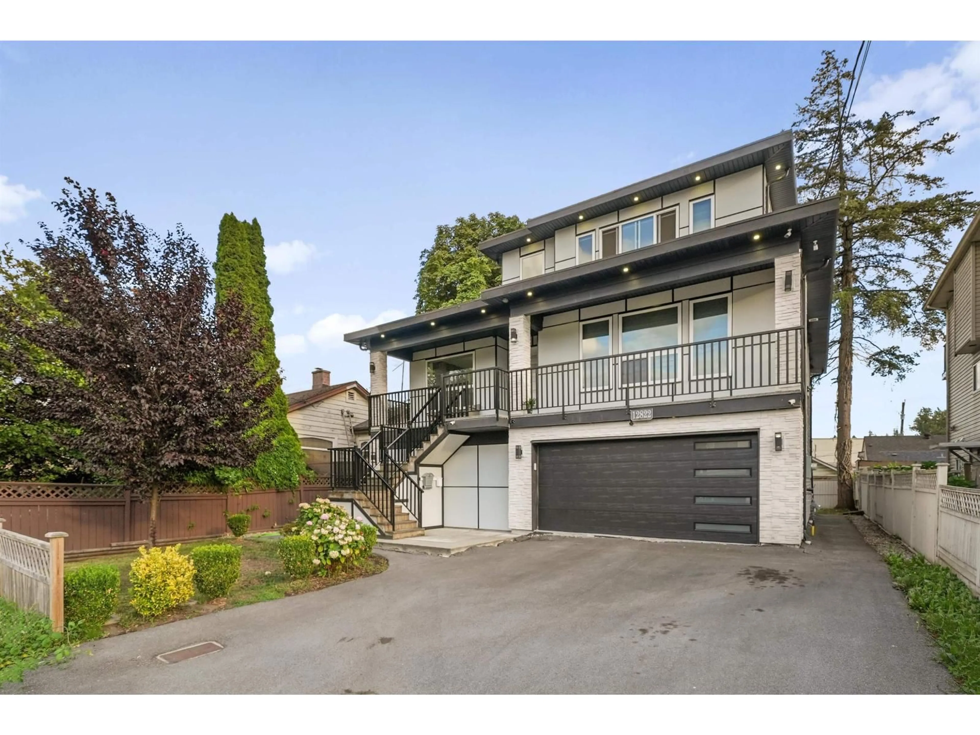 A pic from outside/outdoor area/front of a property/back of a property/a pic from drone, street for 12822 114A AVENUE, Surrey British Columbia V3R2M9