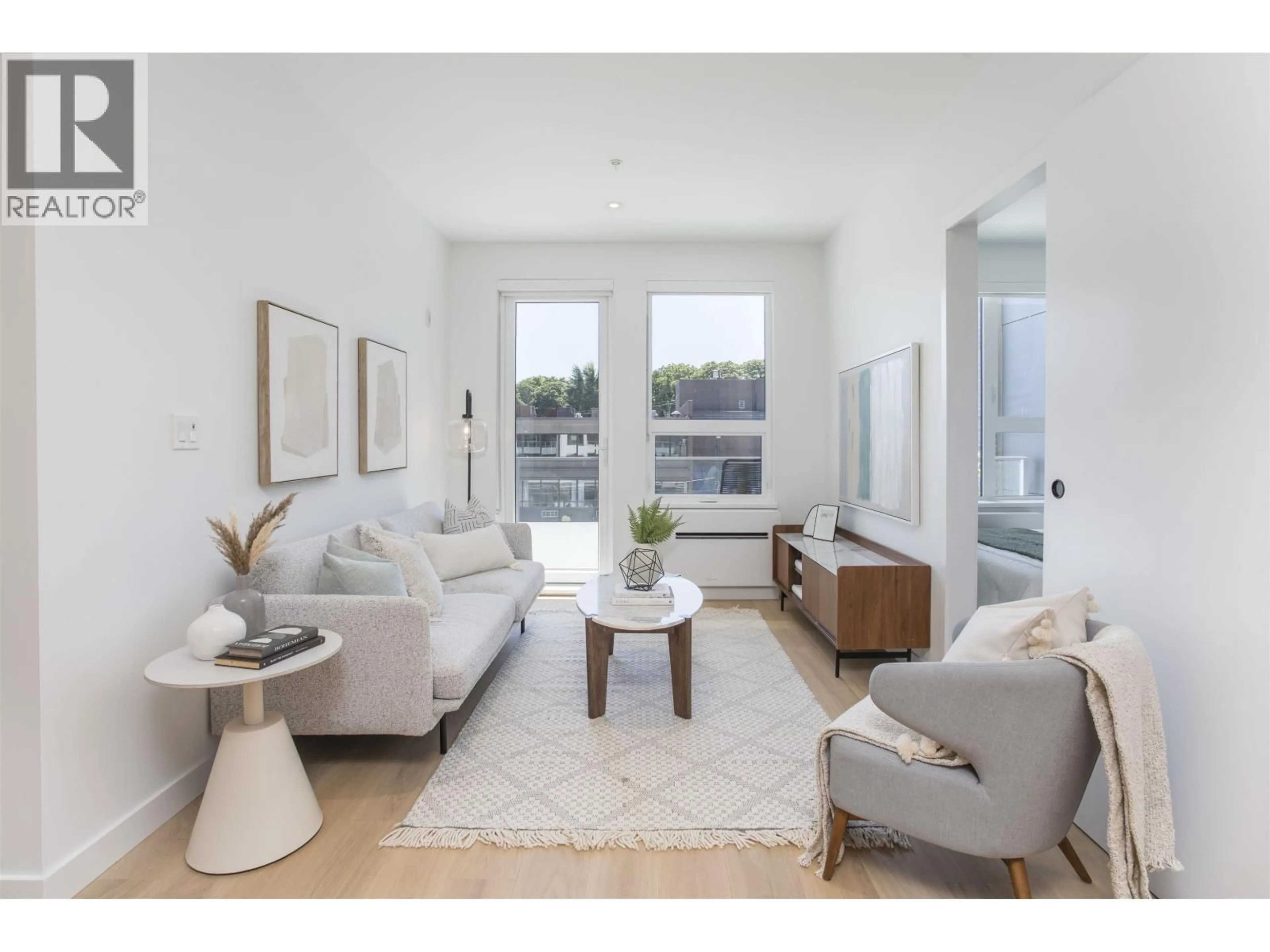 Living room with furniture, unknown for 407 - 2471 ST. GEORGE STREET, Vancouver British Columbia V5T1W9