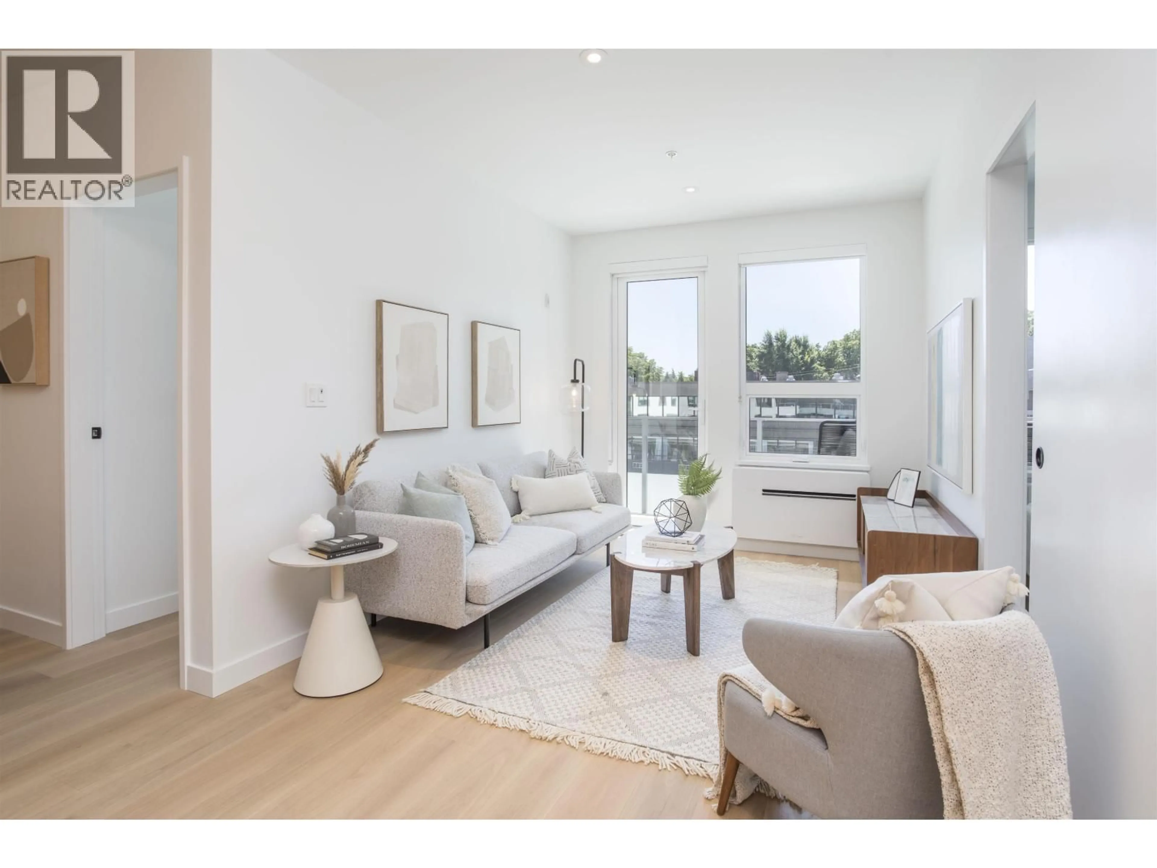 Living room with furniture, unknown for 407 - 2471 ST. GEORGE STREET, Vancouver British Columbia V5T1W9