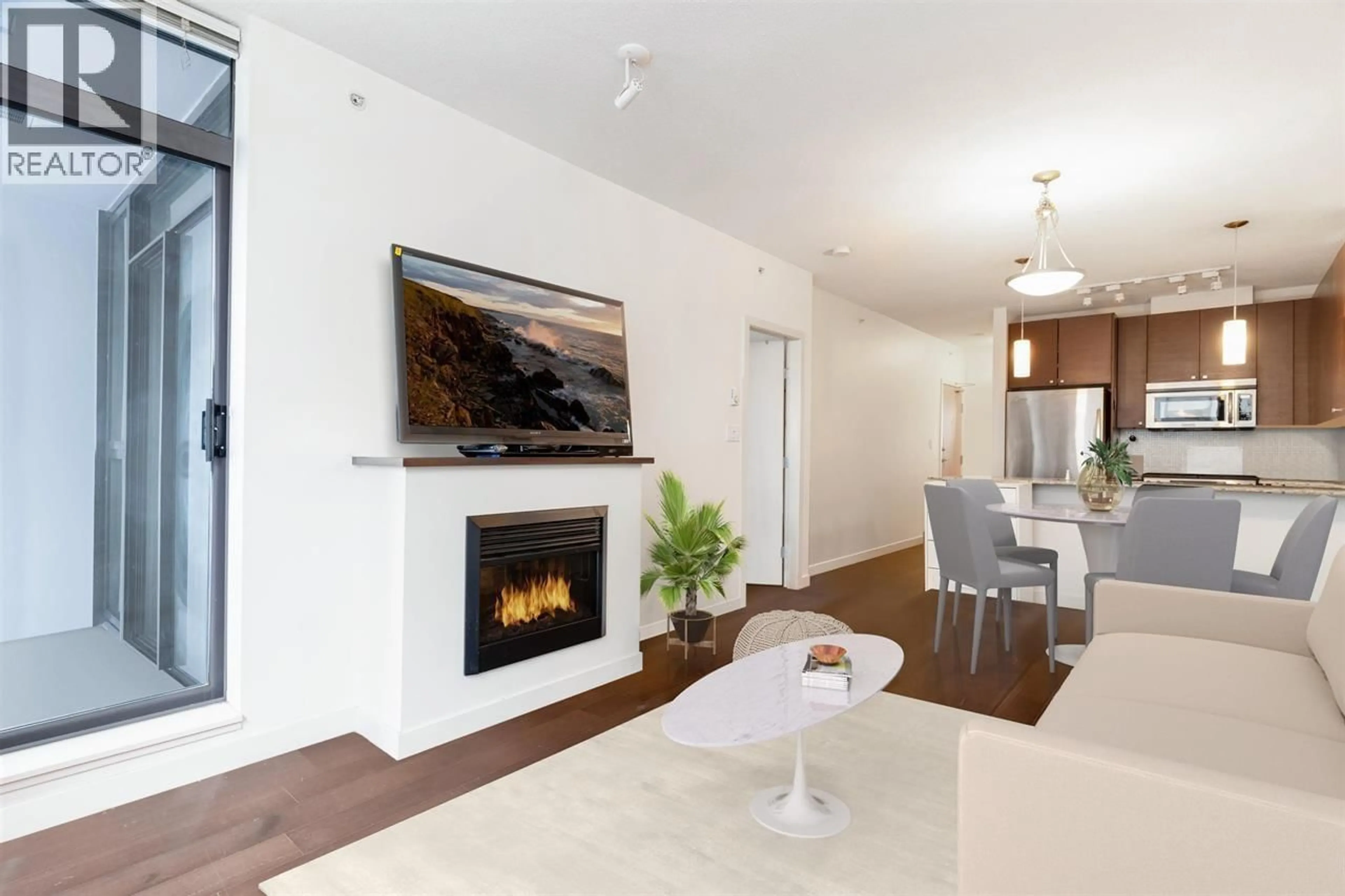 Living room with furniture, wood/laminate floor for 601 - 400 CAPILANO ROAD, Port Moody British Columbia V3H0E1
