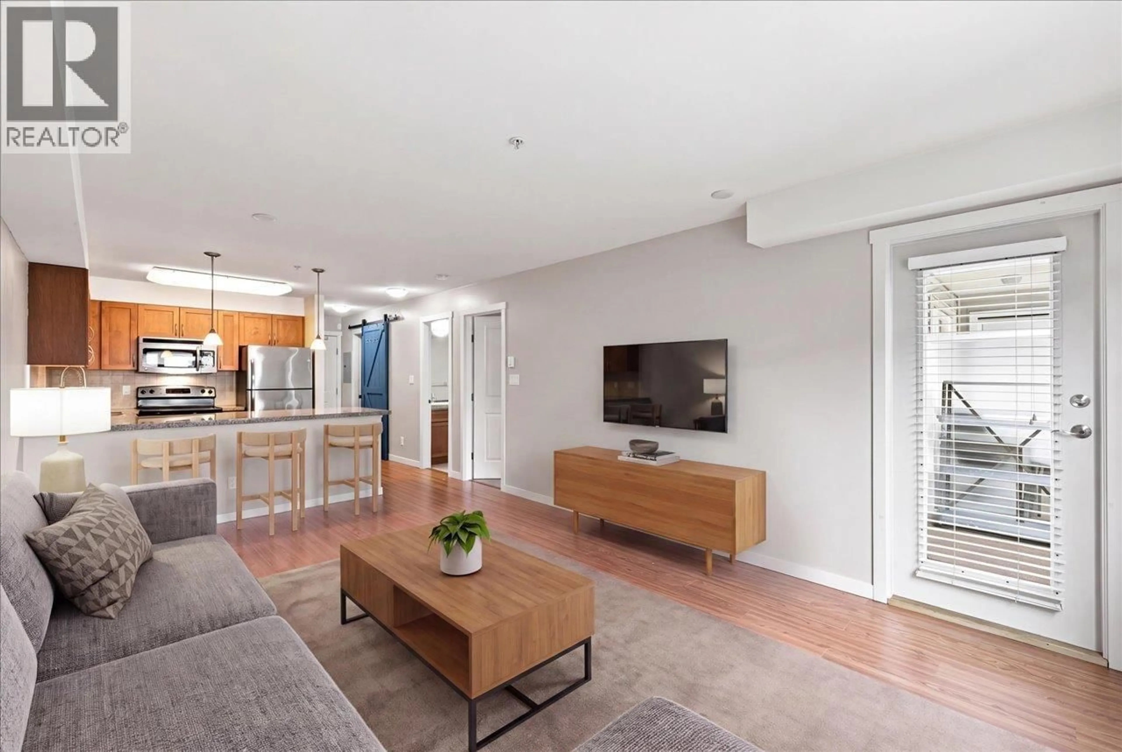 Living room with furniture, unknown for 205 - 2373 ATKINS AVENUE, Port Coquitlam British Columbia V3C1Y7