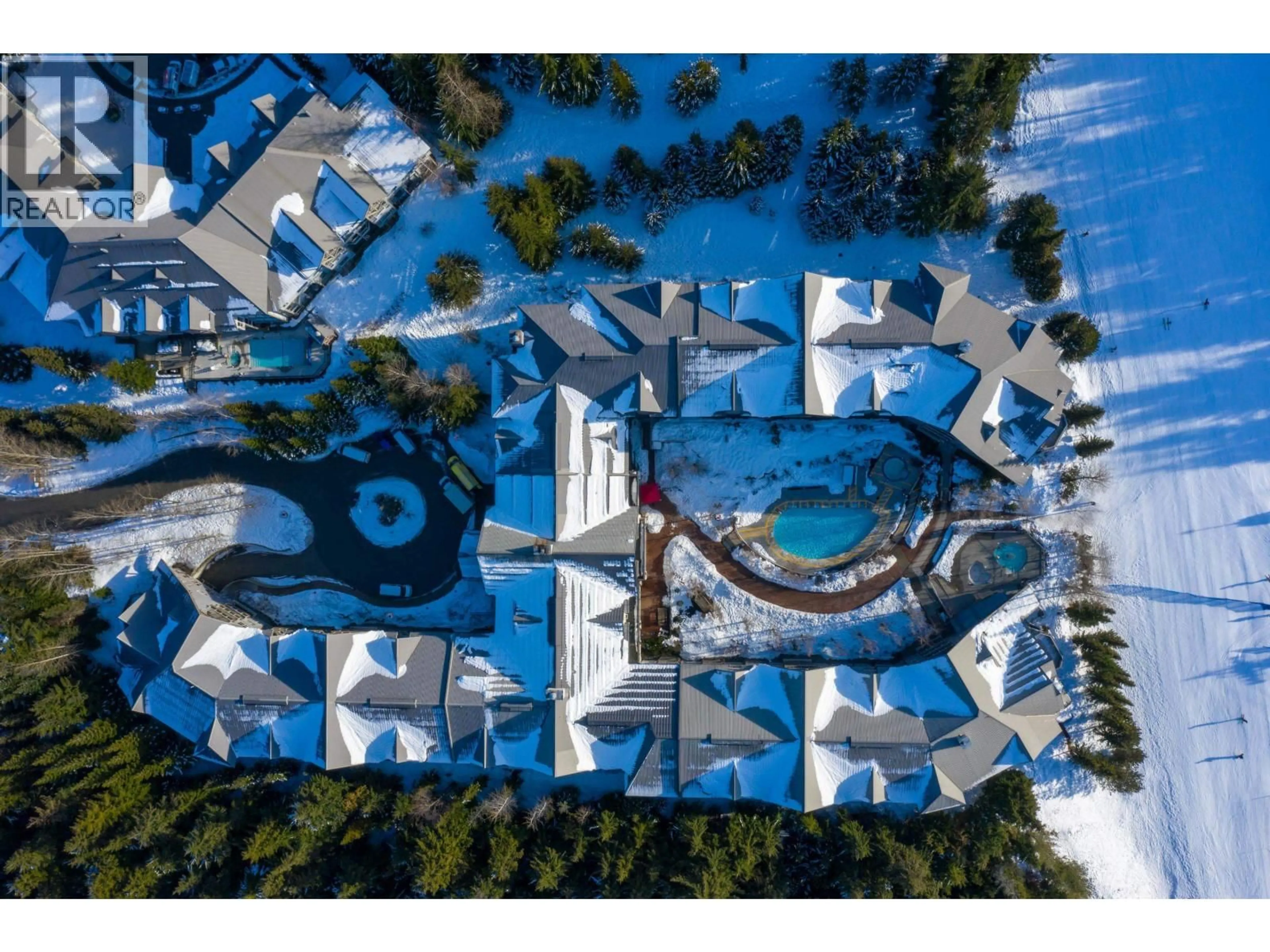 A pic from outside/outdoor area/front of a property/back of a property/a pic from drone, unknown for 116 - 4800 SPEARHEAD DRIVE, Whistler British Columbia V8E1G1