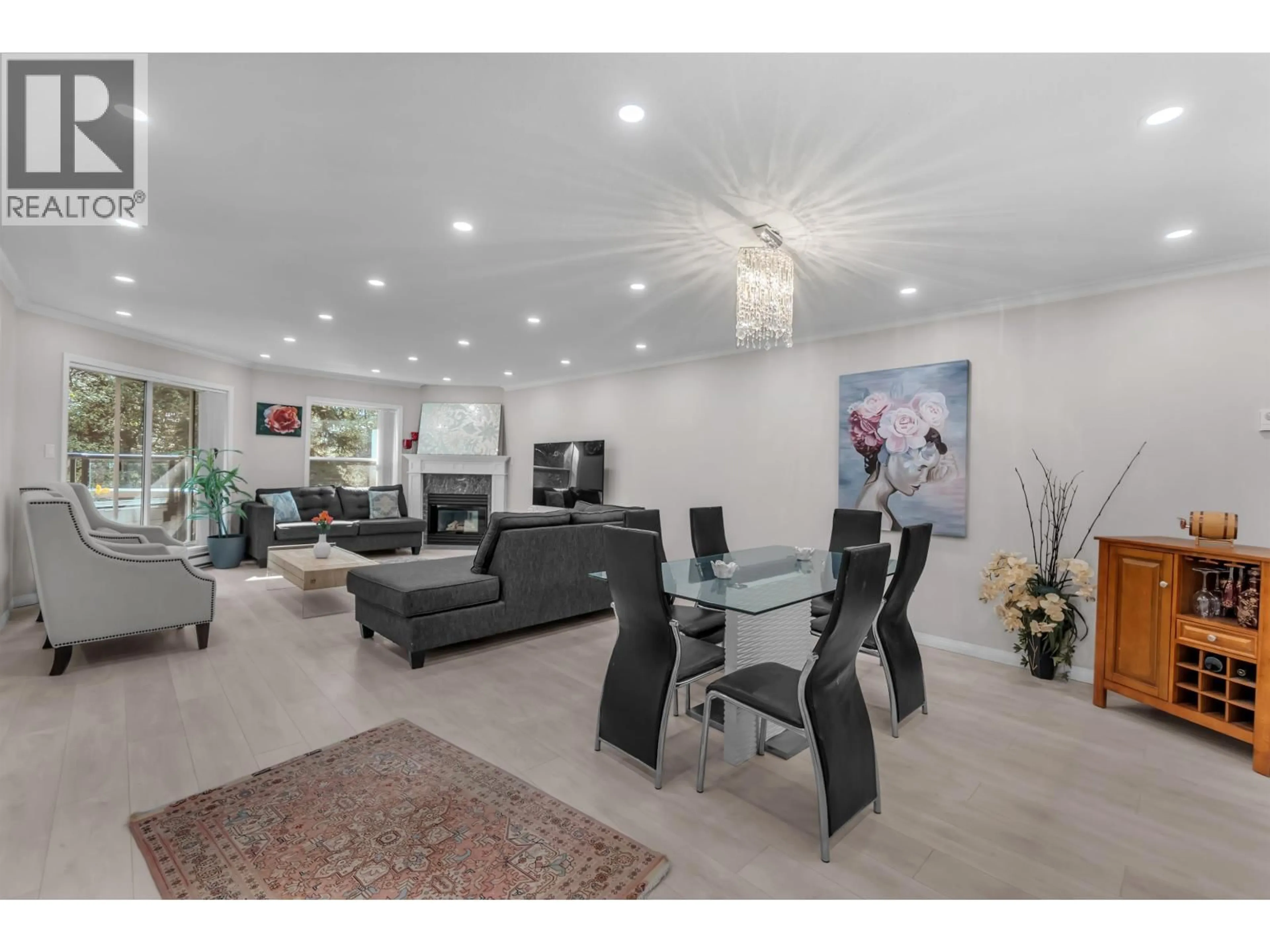 Living room with furniture, unknown for 207 - 1500 OSTLER COURT, North Vancouver British Columbia V7G2S2