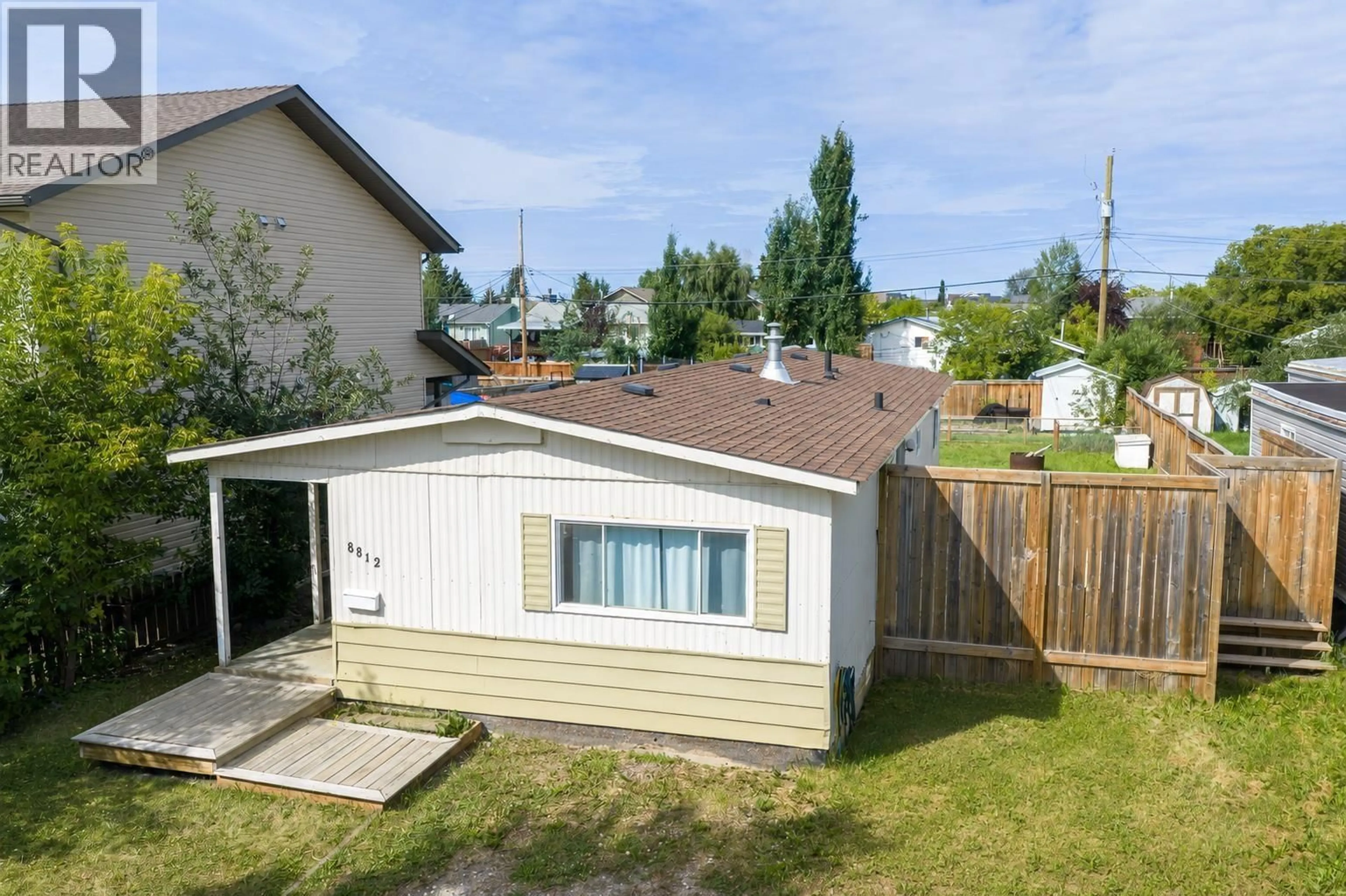 A pic from outside/outdoor area/front of a property/back of a property/a pic from drone, street for 8812 76 STREET, Fort St. John British Columbia V1J2Z6