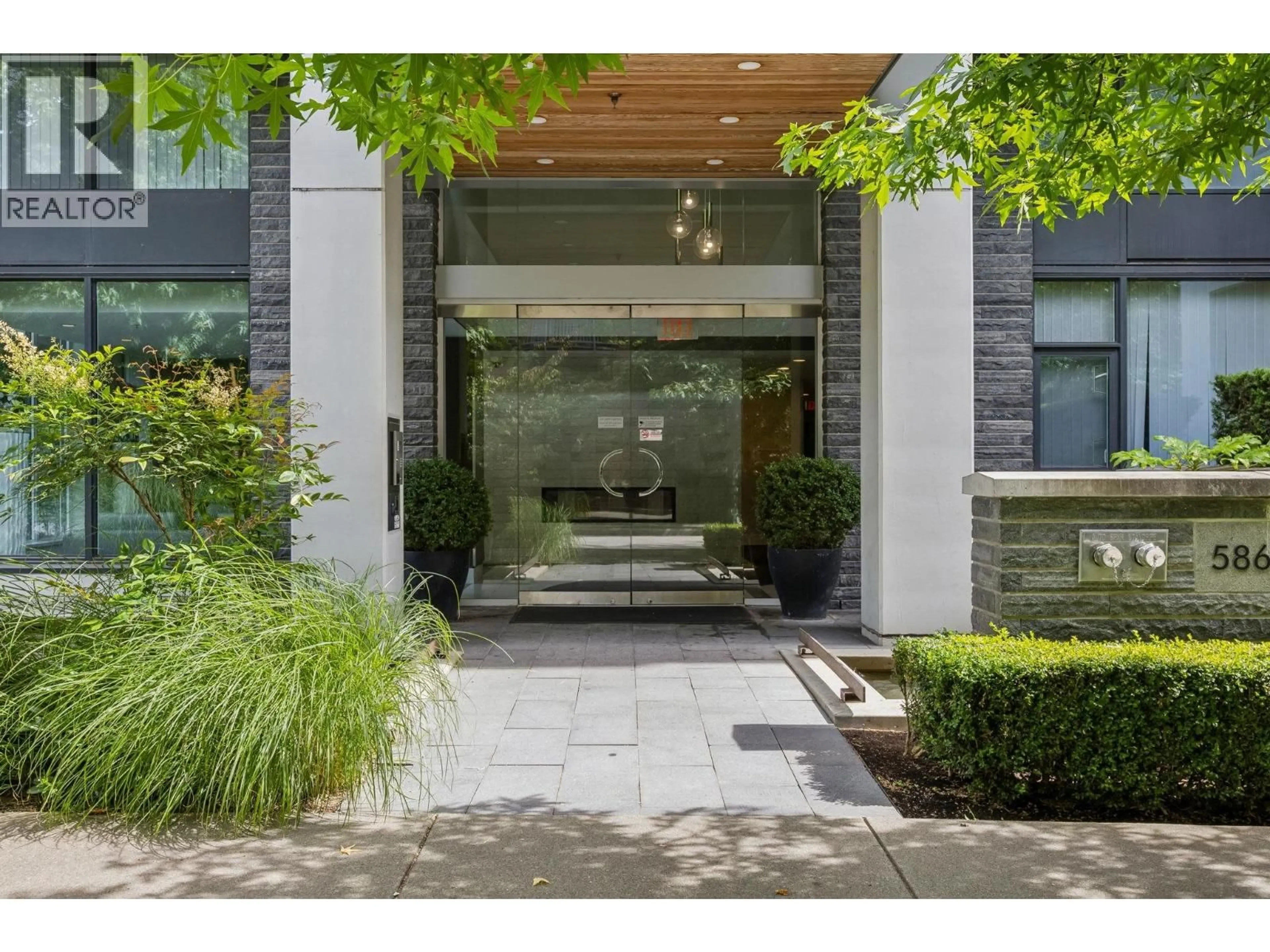 Indoor foyer for 105 - 5868 AGRONOMY ROAD, Vancouver British Columbia V6T0B5