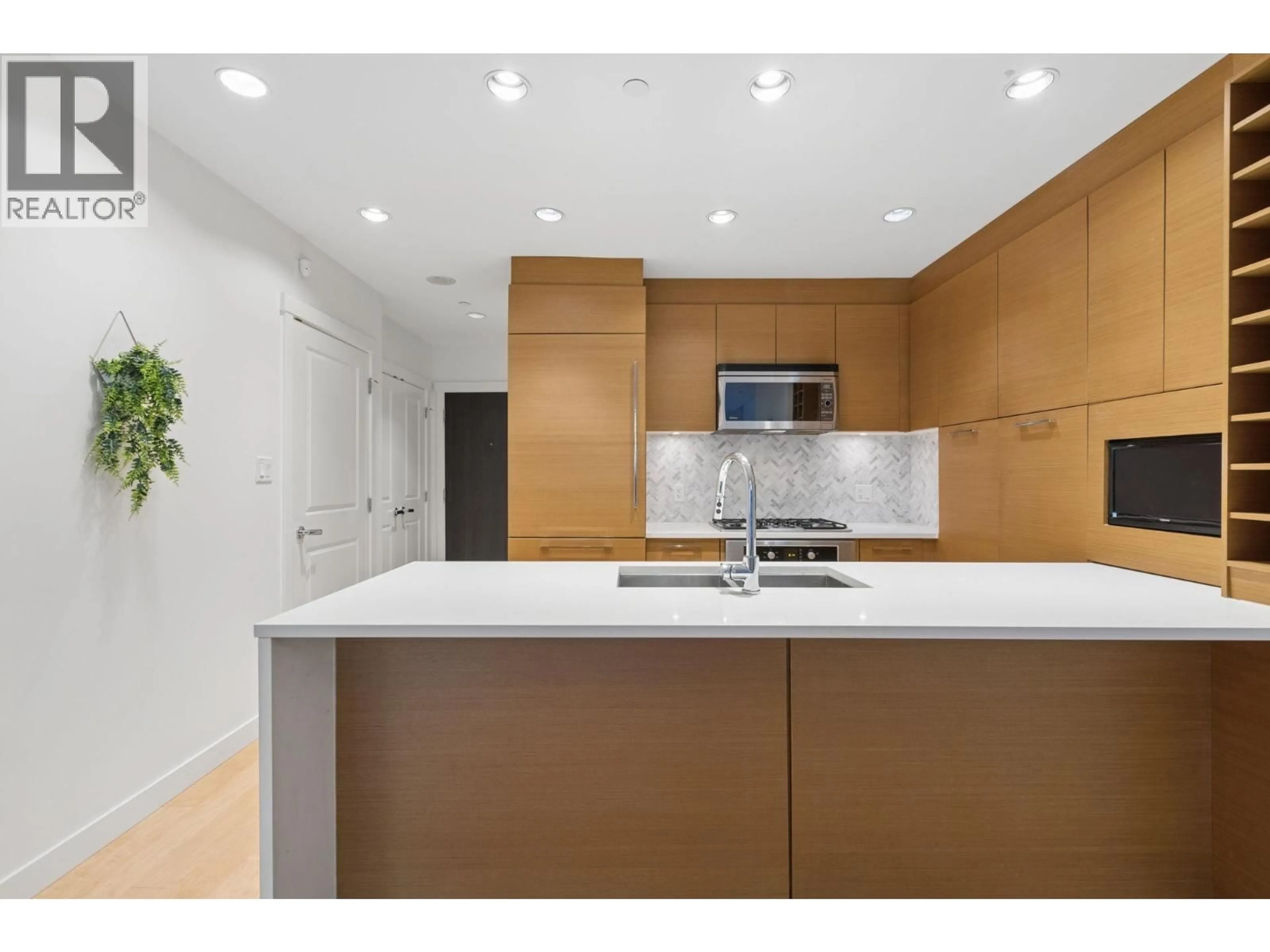 Open concept kitchen, unknown for 105 - 5868 AGRONOMY ROAD, Vancouver British Columbia V6T0B5