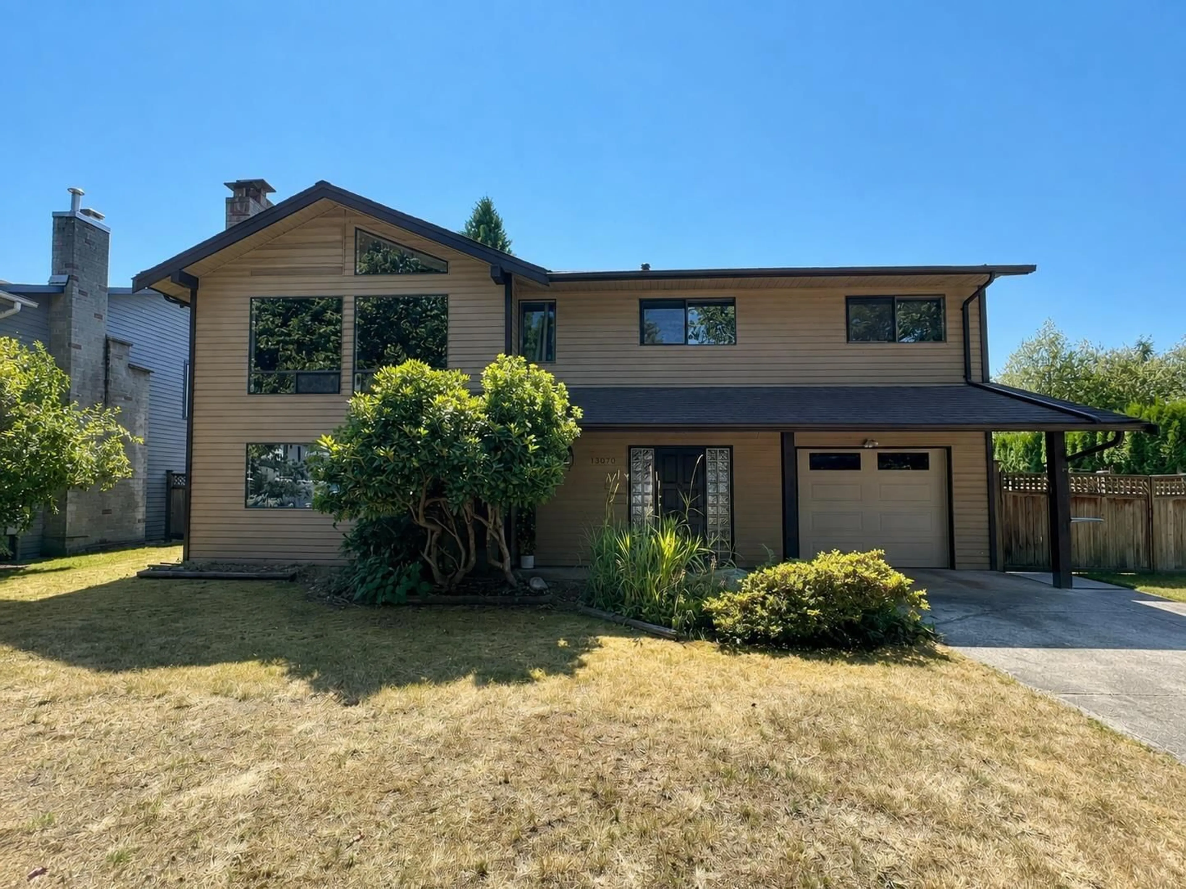 Home with vinyl exterior material, street for 13070 61A AVENUE, Surrey British Columbia V3X2G8