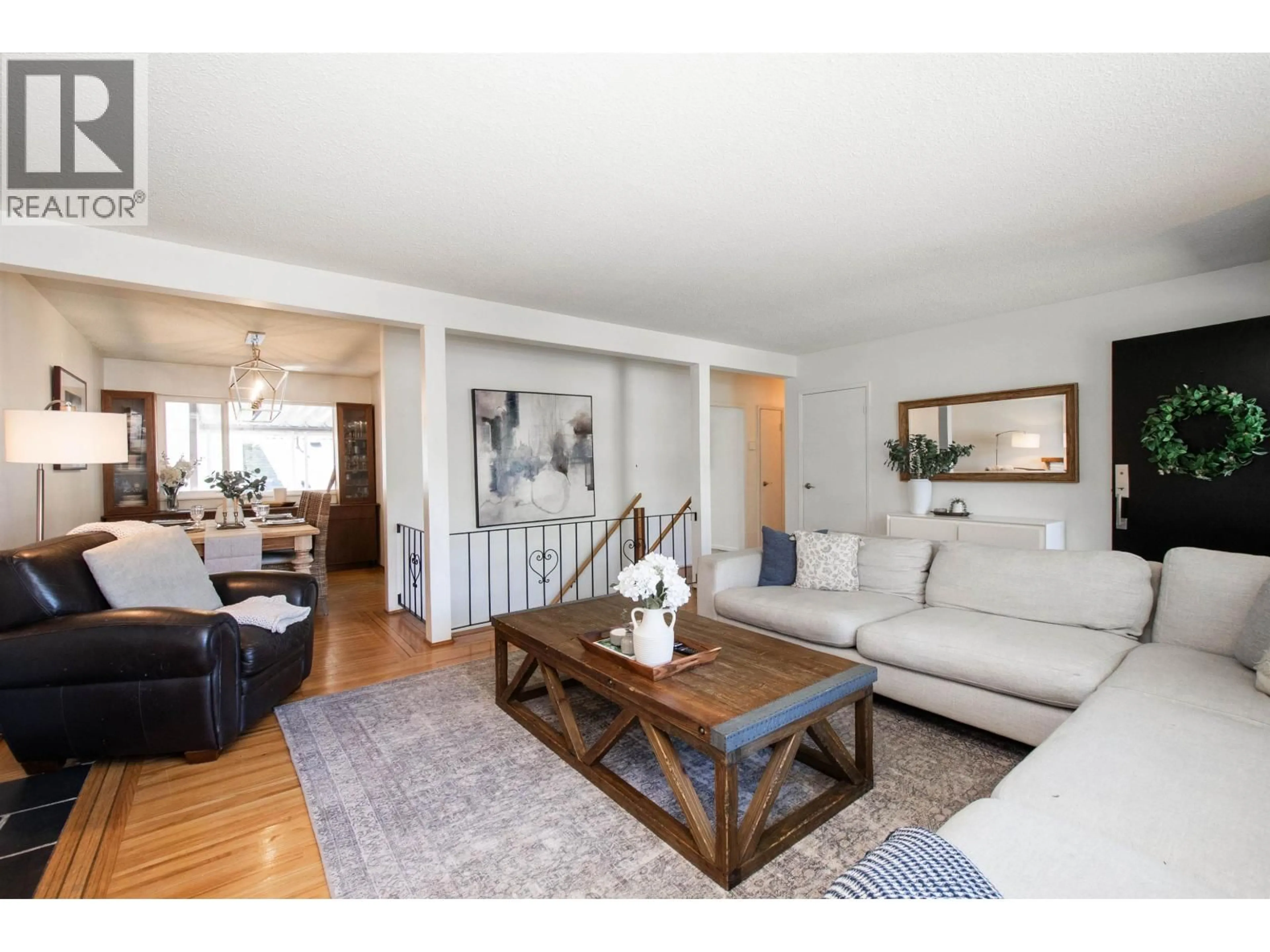 Living room with furniture, wood/laminate floor for 361 19TH STREET, North Vancouver British Columbia V7M1X7