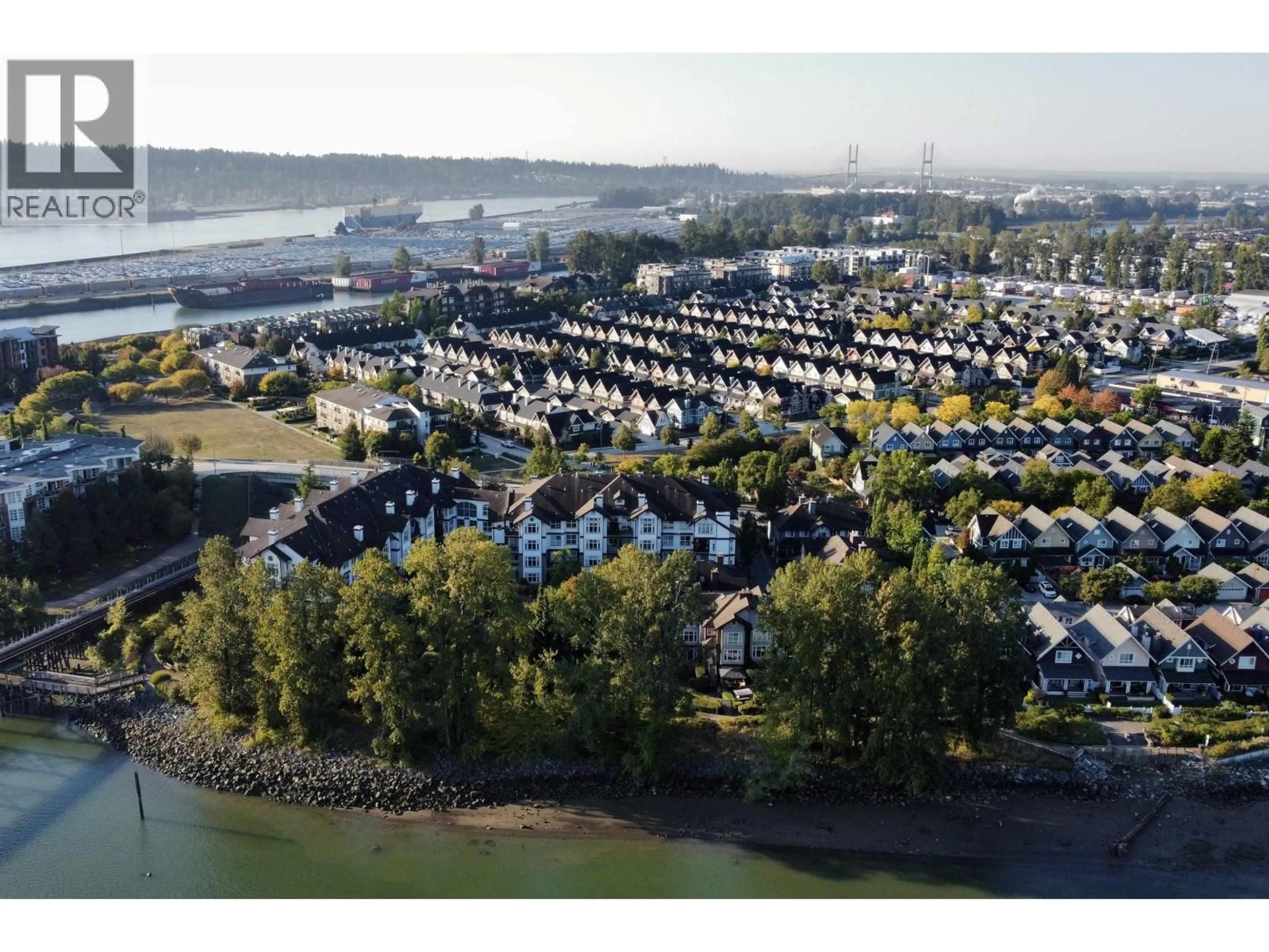 A pic from outside/outdoor area/front of a property/back of a property/a pic from drone, water/lake/river/ocean view for 408 - 83 STAR CRESCENT, New Westminster British Columbia V3M6X8
