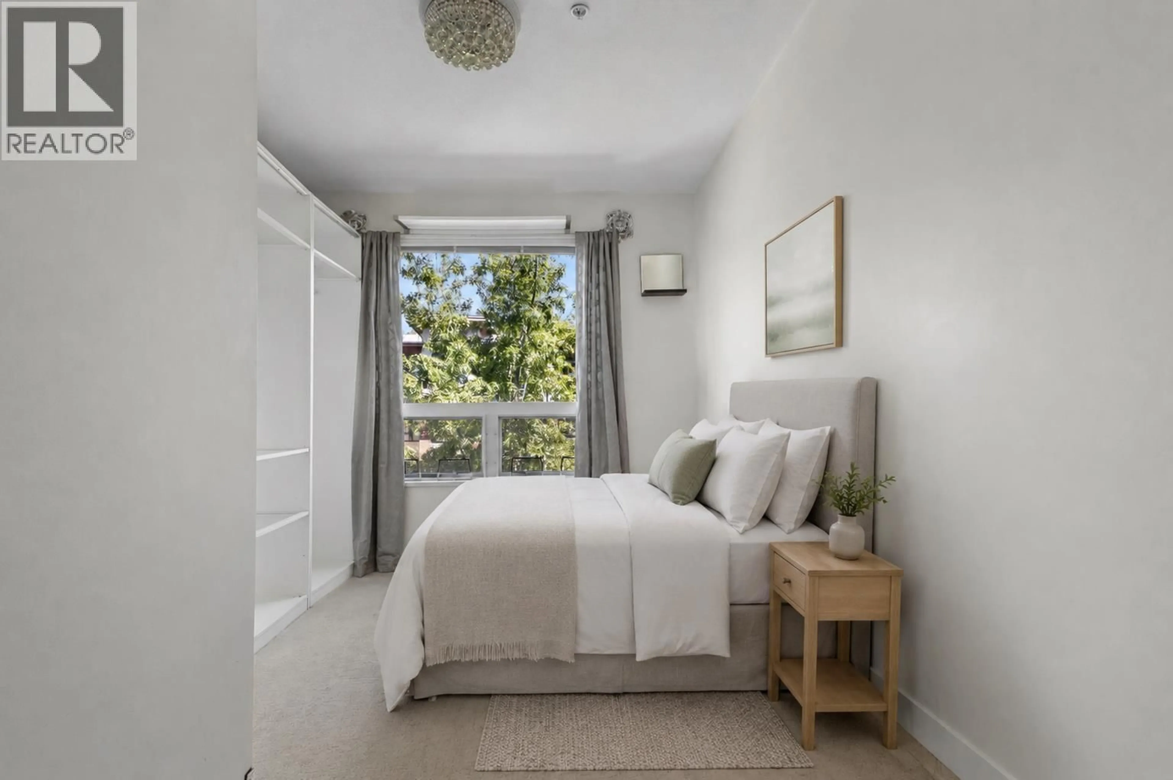 Bedroom with bed, unknown for 312 - 3138 RIVERWALK AVENUE, Vancouver British Columbia V5S0B6