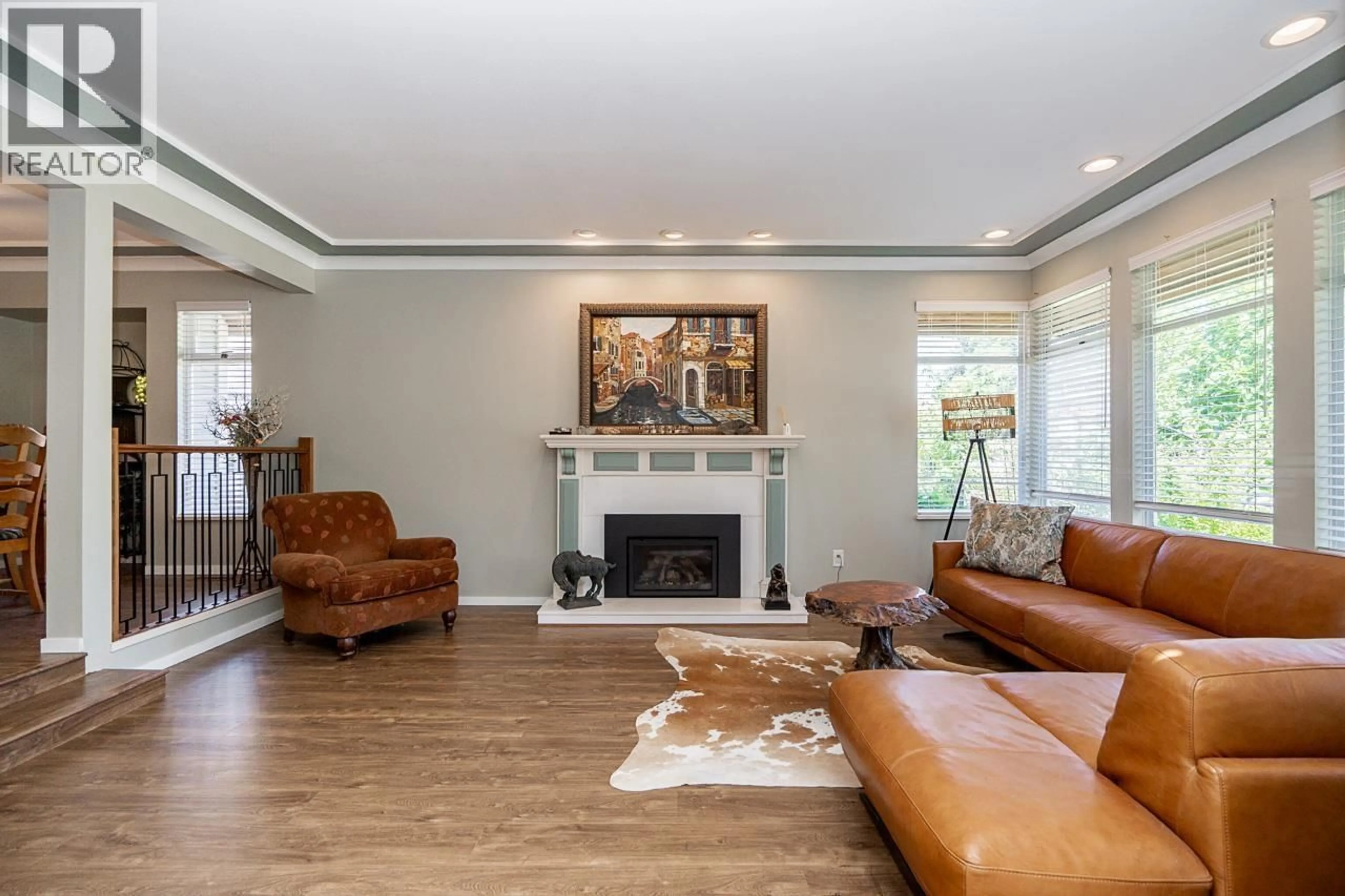 Living room with furniture, wood/laminate floor for 12461 205 STREET, Maple Ridge British Columbia V2X0B1
