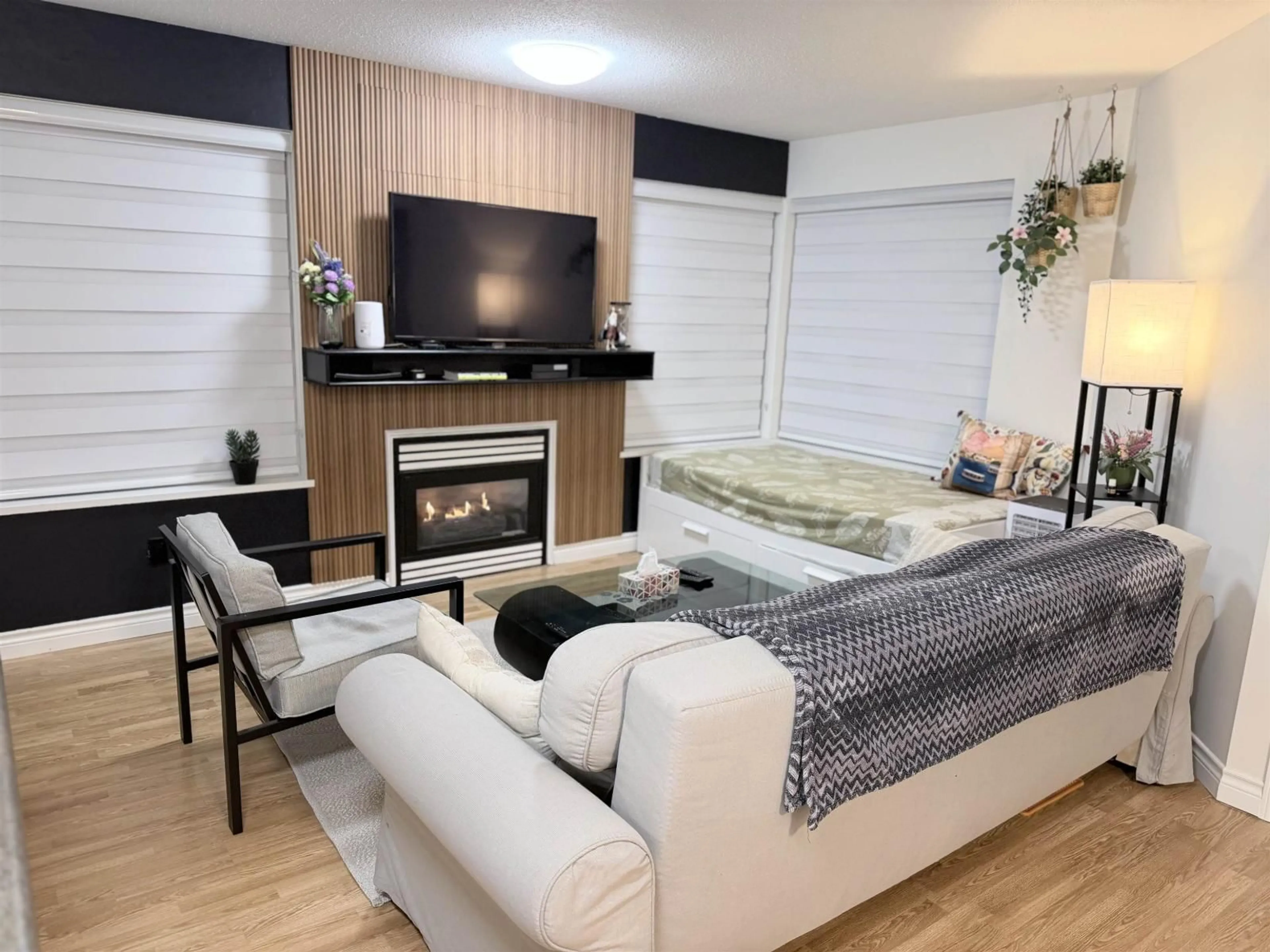 Living room with furniture, wood/laminate floor for 324 - 20200 56 AVENUE, Langley British Columbia V3A8S1