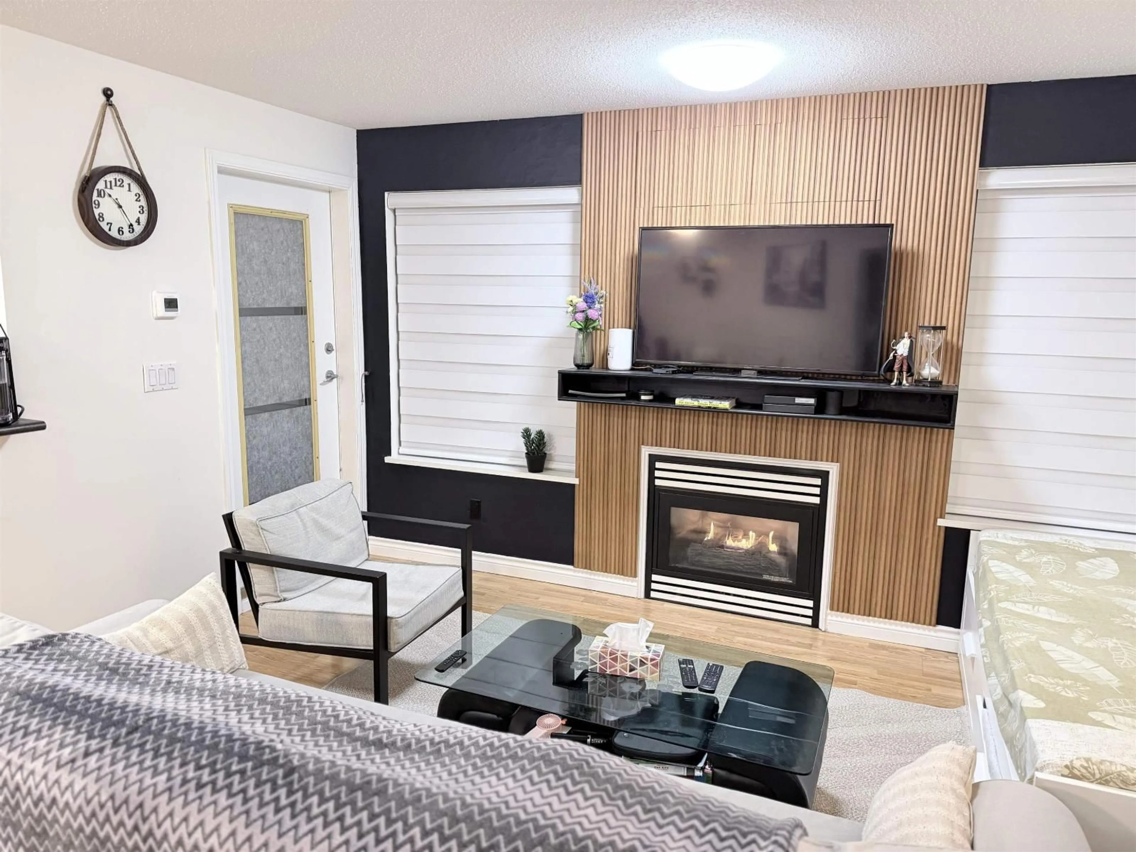 Living room with furniture, wood/laminate floor for 324 - 20200 56 AVENUE, Langley British Columbia V3A8S1