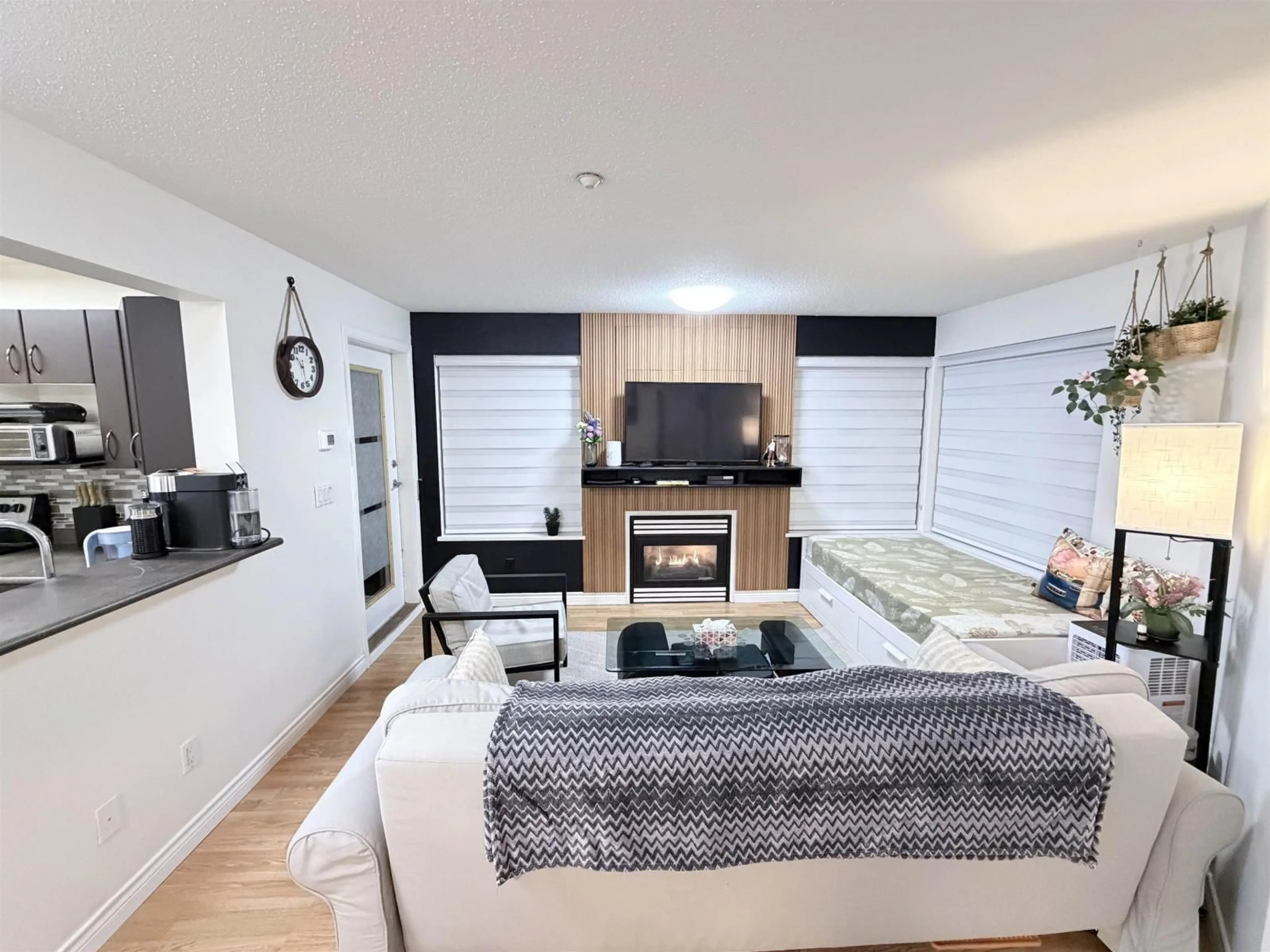 Living room with furniture, wood/laminate floor for 324 - 20200 56 AVENUE, Langley British Columbia V3A8S1