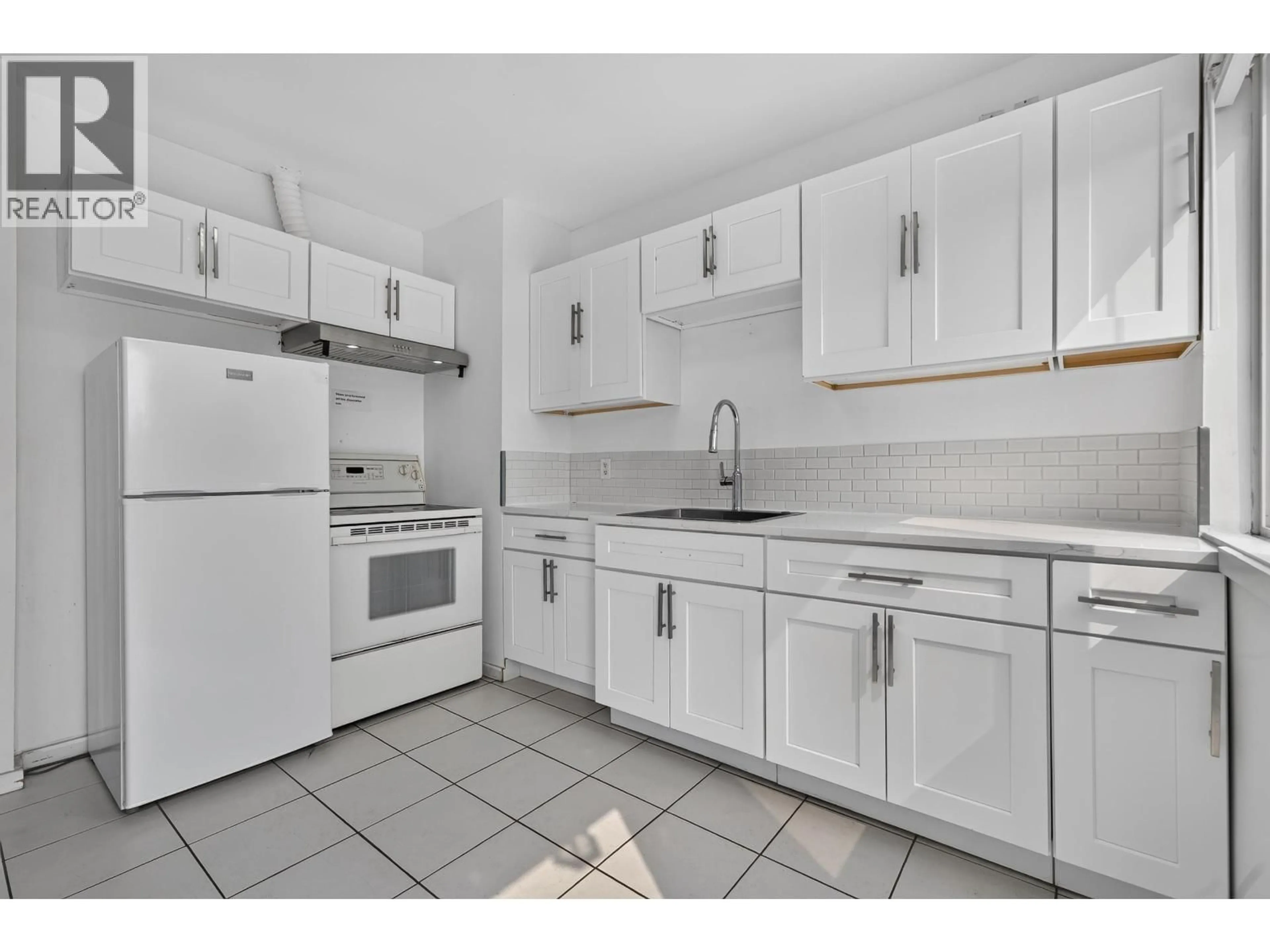 Standard kitchen, ceramic/tile floor for 2316 NANAIMO STREET, Vancouver British Columbia V5N5E3