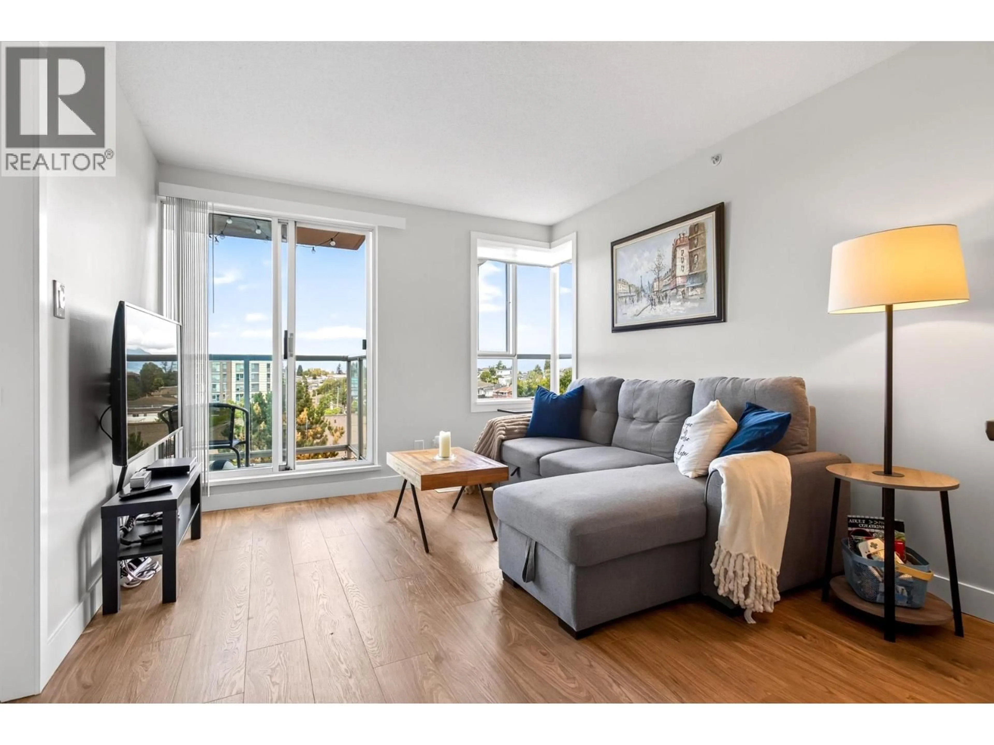 Living room with furniture, wood/laminate floor for 806 - 3455 ASCOT PLACE, Vancouver British Columbia V5R6B7