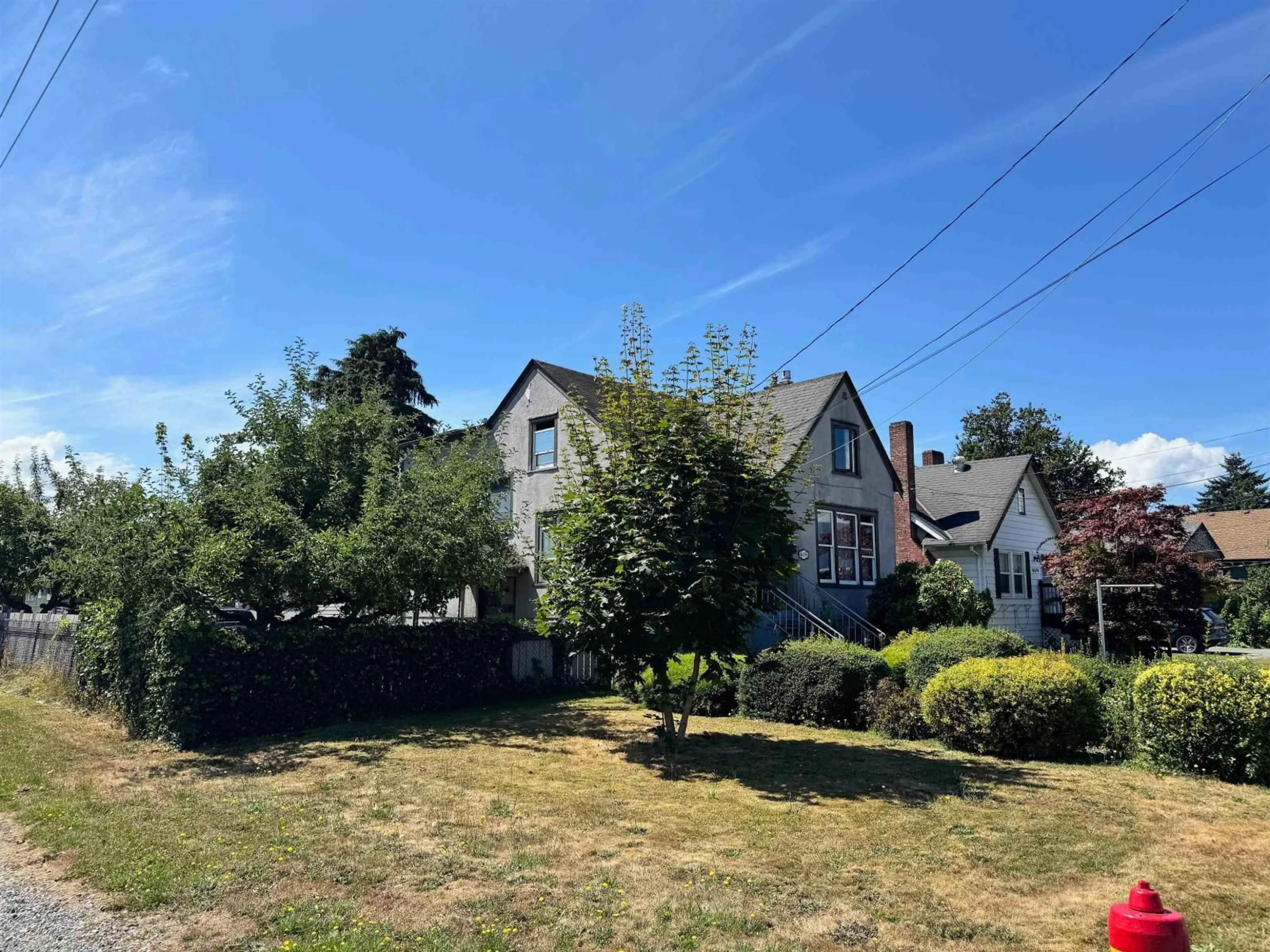 A pic from outside/outdoor area/front of a property/back of a property/a pic from drone, street for 46198 FIRST AVENUE, Chilliwack British Columbia V2P1W3