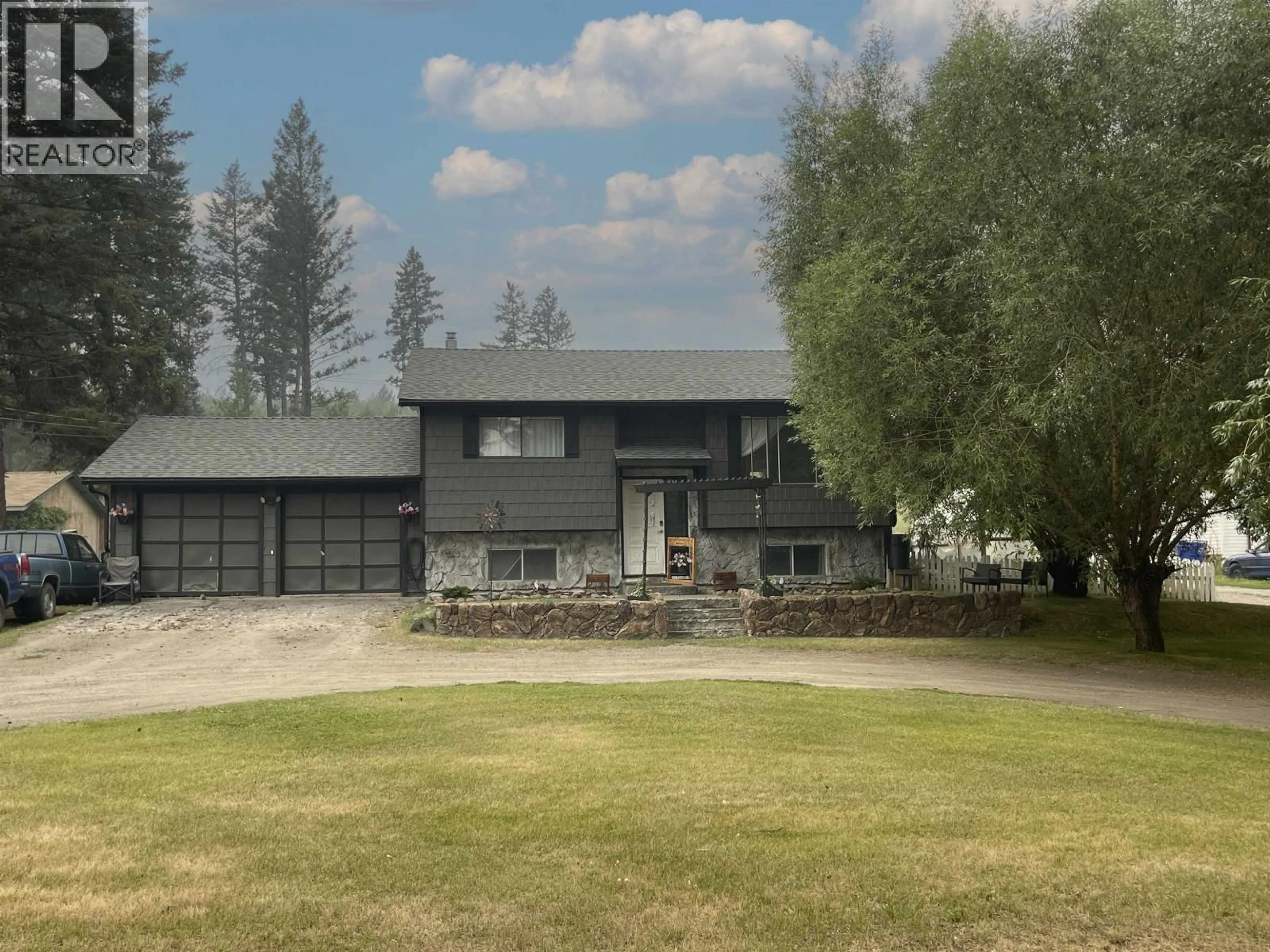 A pic from outside/outdoor area/front of a property/back of a property/a pic from drone, mountain view for 5418 PARK DRIVE, 103 Mile House British Columbia V0K2E1