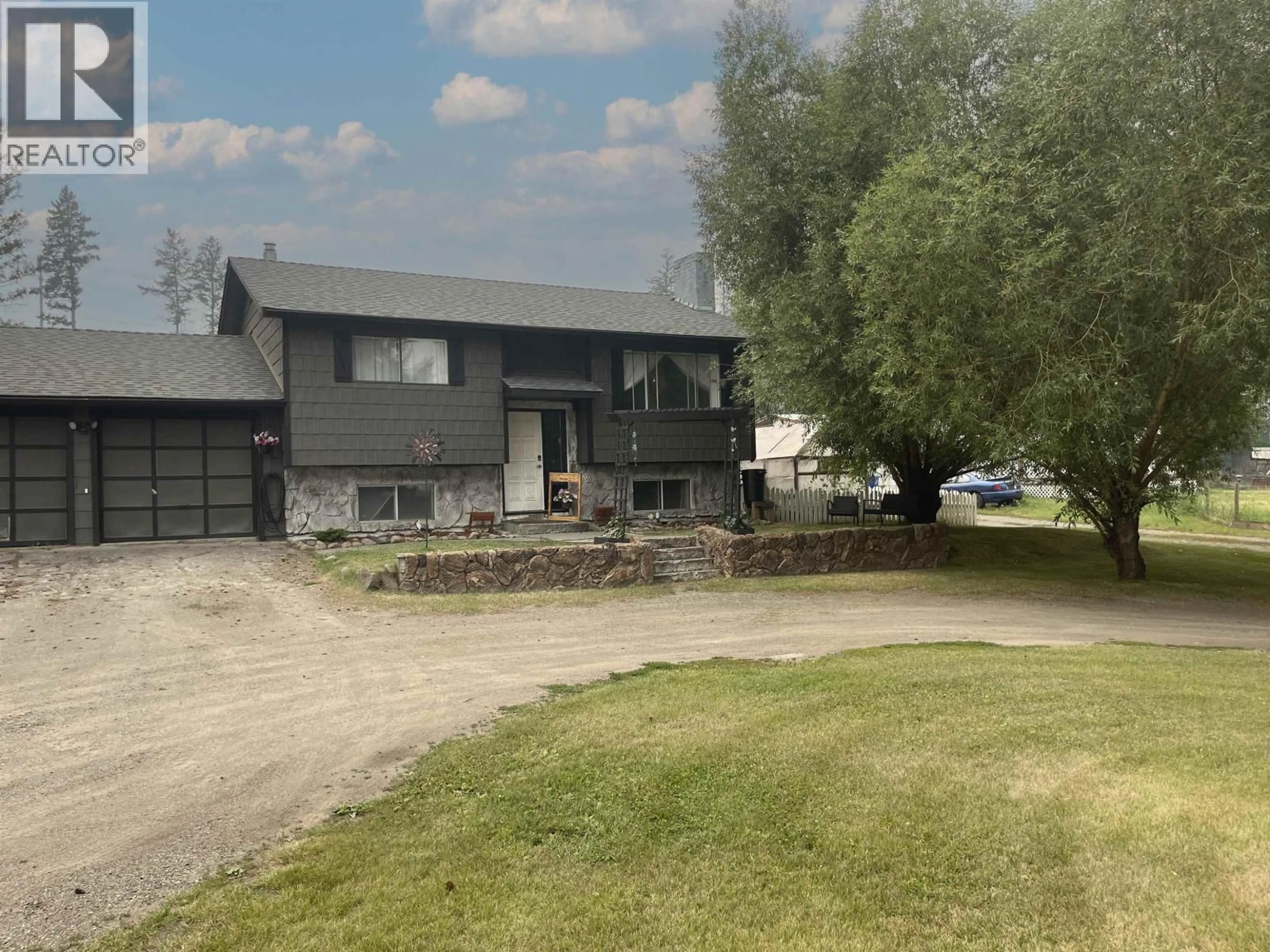 A pic from outside/outdoor area/front of a property/back of a property/a pic from drone, street for 5418 PARK DRIVE, 103 Mile House British Columbia V0K2E1