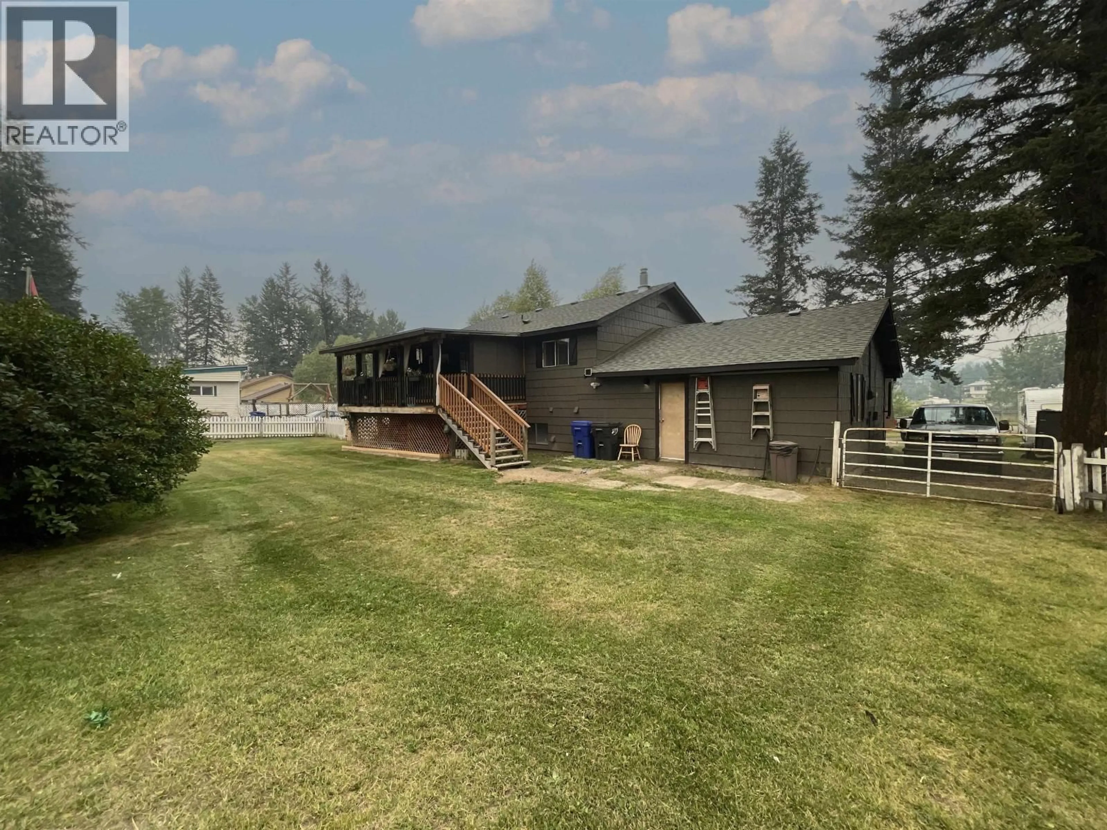 A pic from outside/outdoor area/front of a property/back of a property/a pic from drone, unknown for 5418 PARK DRIVE, 103 Mile House British Columbia V0K2E1