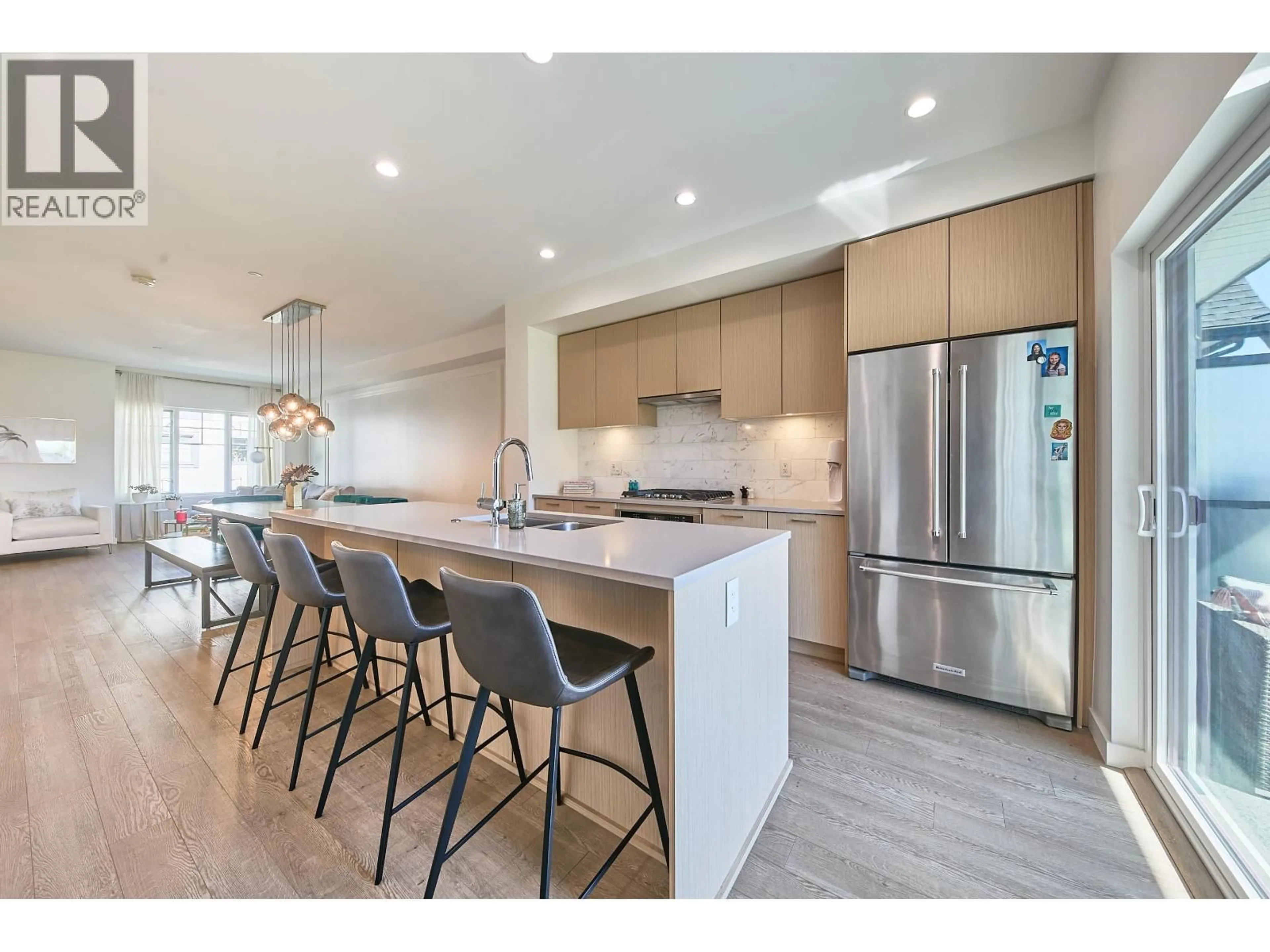 Open concept kitchen, wood/laminate floor for 204 - 19451 SUTTON AVENUE, Pitt Meadows British Columbia V3Y0G6