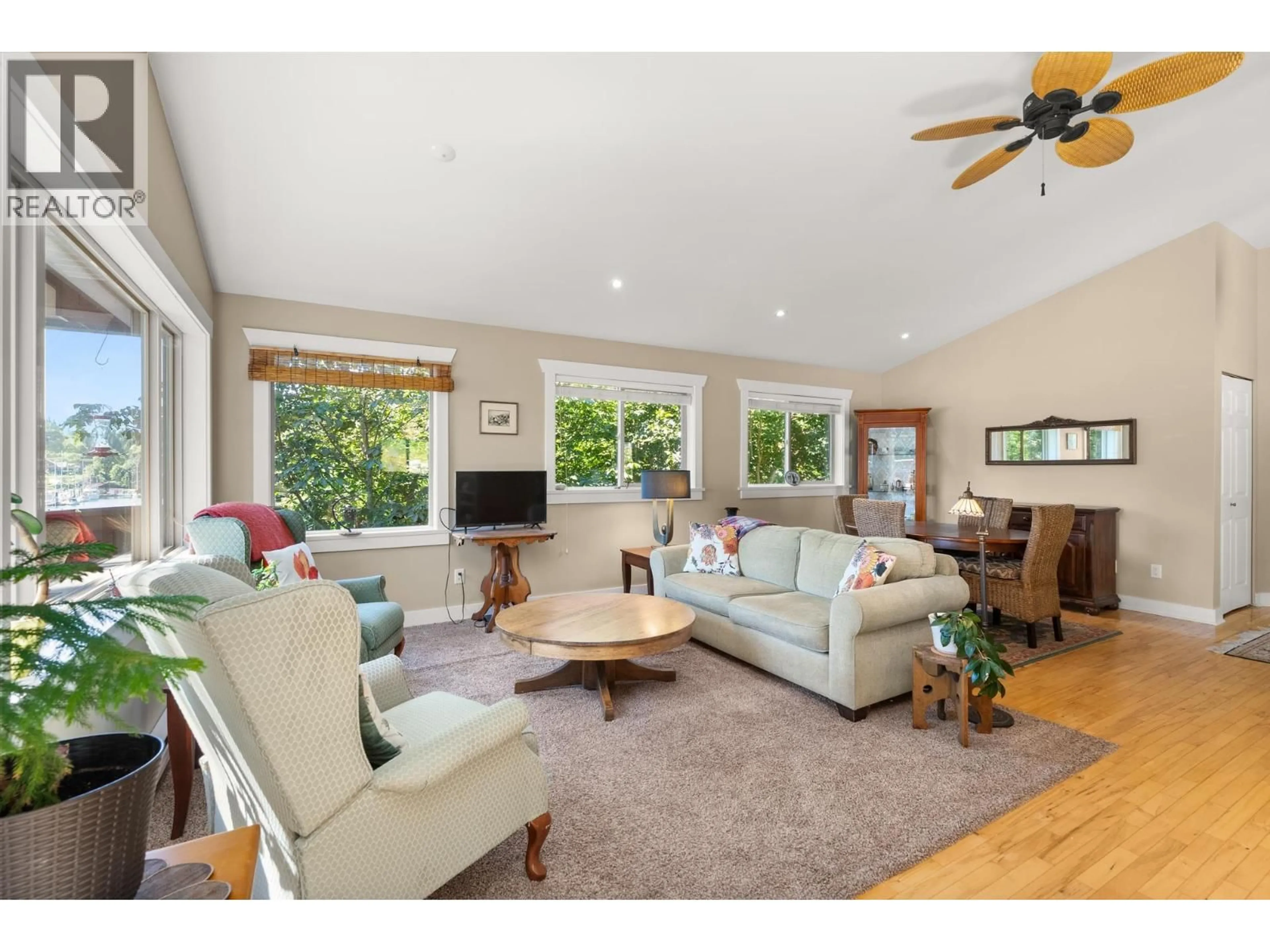 Living room with furniture, wood/laminate floor for 4371 FRANCIS PENINSULA ROAD, Madeira Park British Columbia V0N2H1