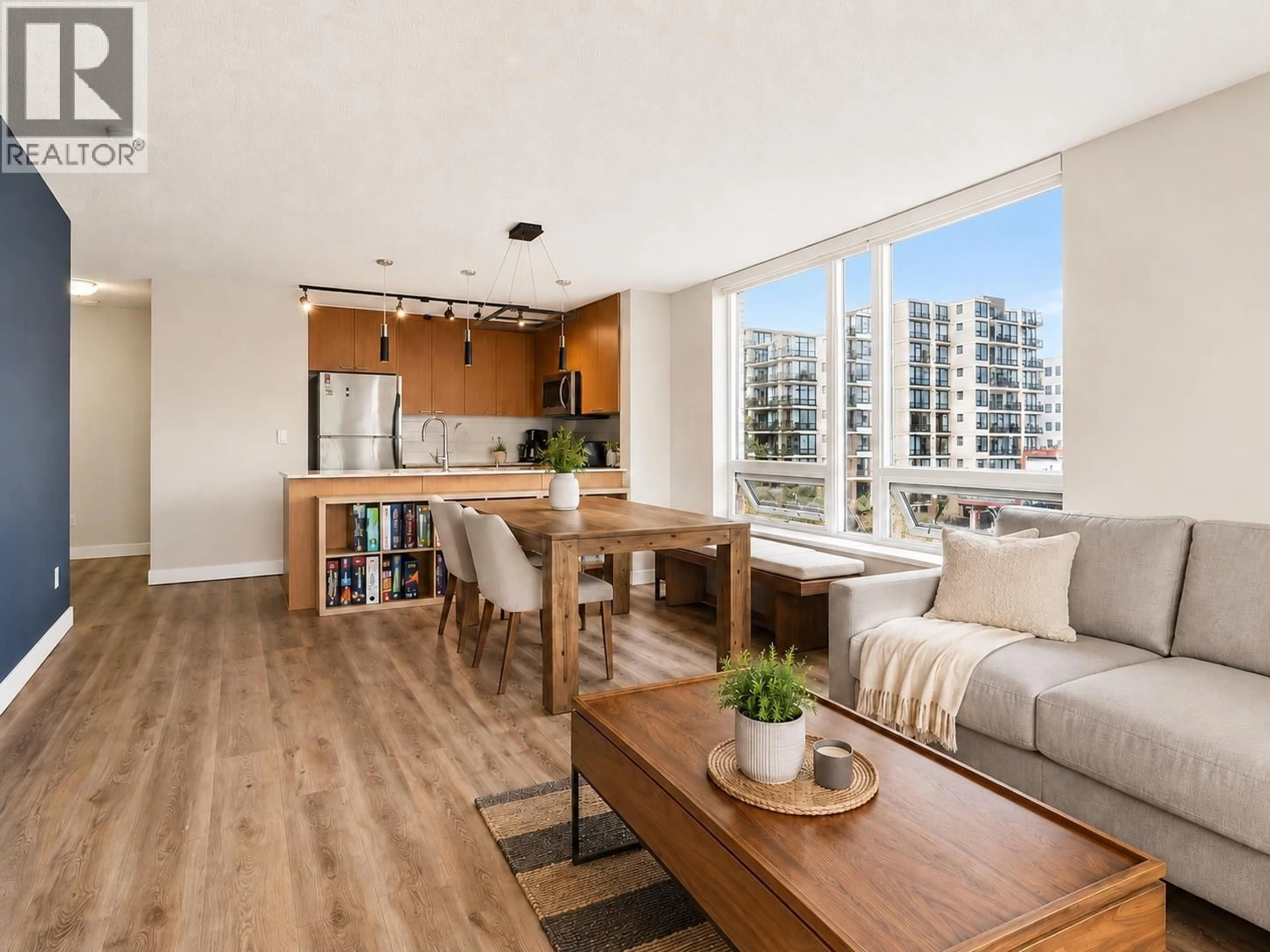 Living room with furniture, wood/laminate floor for 701 - 39 SIXTH STREET, New Westminster British Columbia V3L0B3