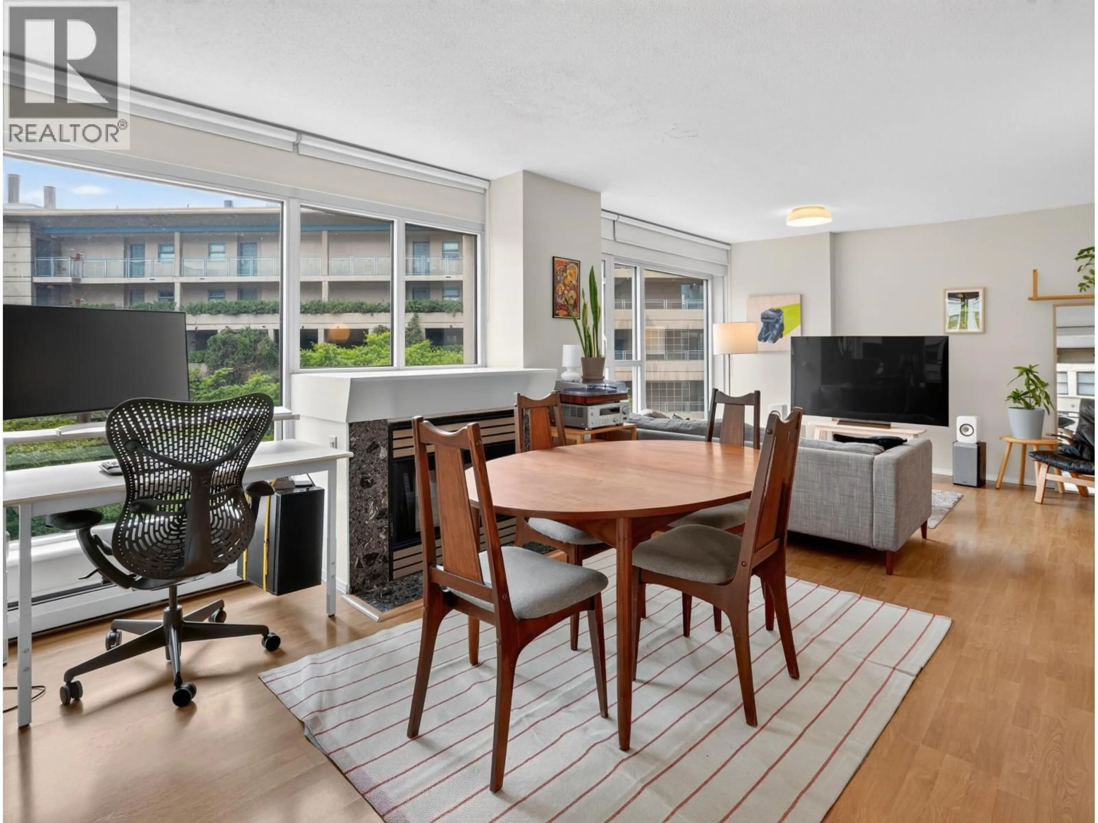 Living room with furniture, wood/laminate floor for 602 - 183 KEEFER PLACE, Vancouver British Columbia V6B6B9