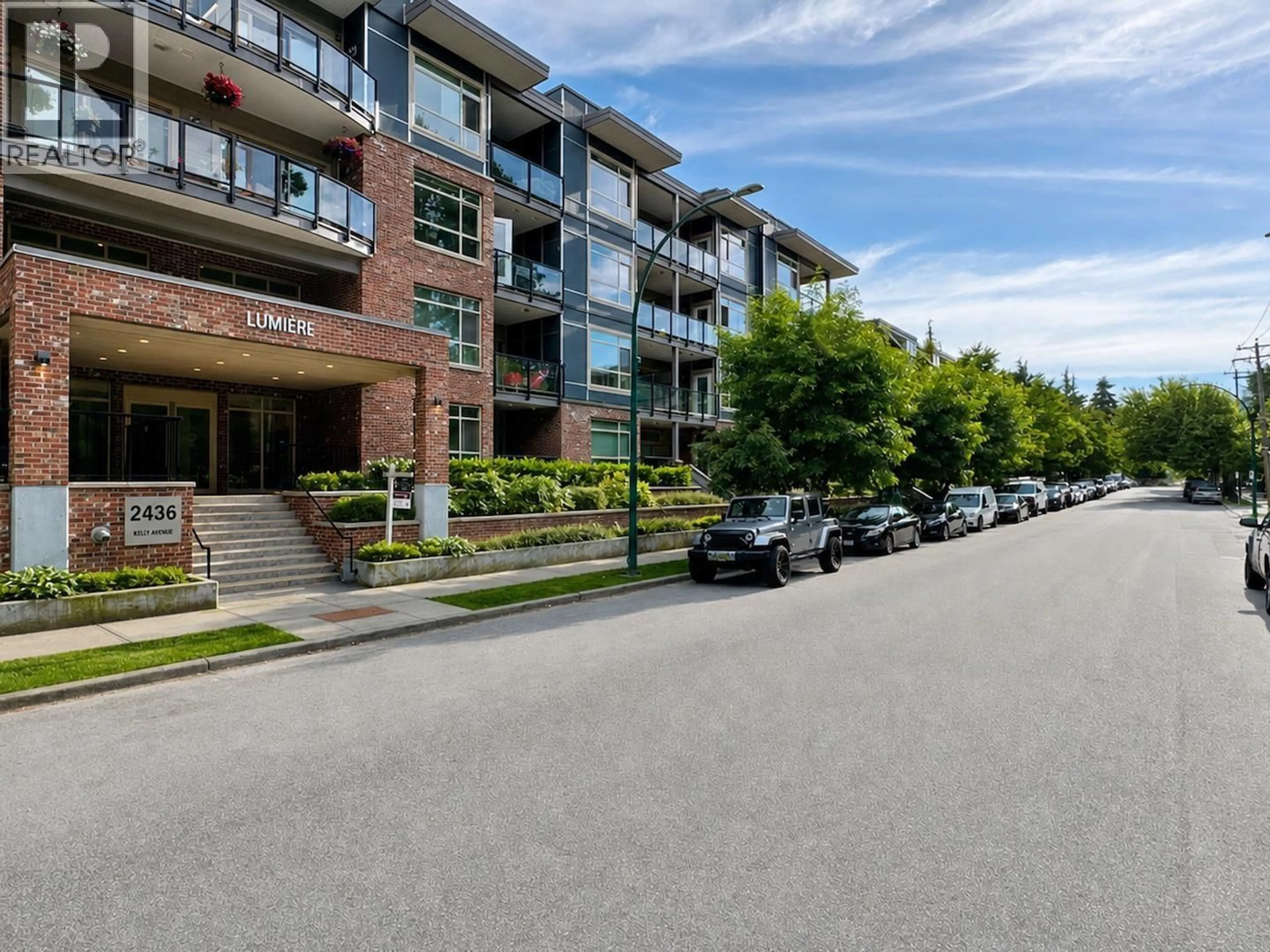 A pic from outside/outdoor area/front of a property/back of a property/a pic from drone, street for 102 - 2436 KELLY AVENUE, Port Coquitlam British Columbia V3C0G9
