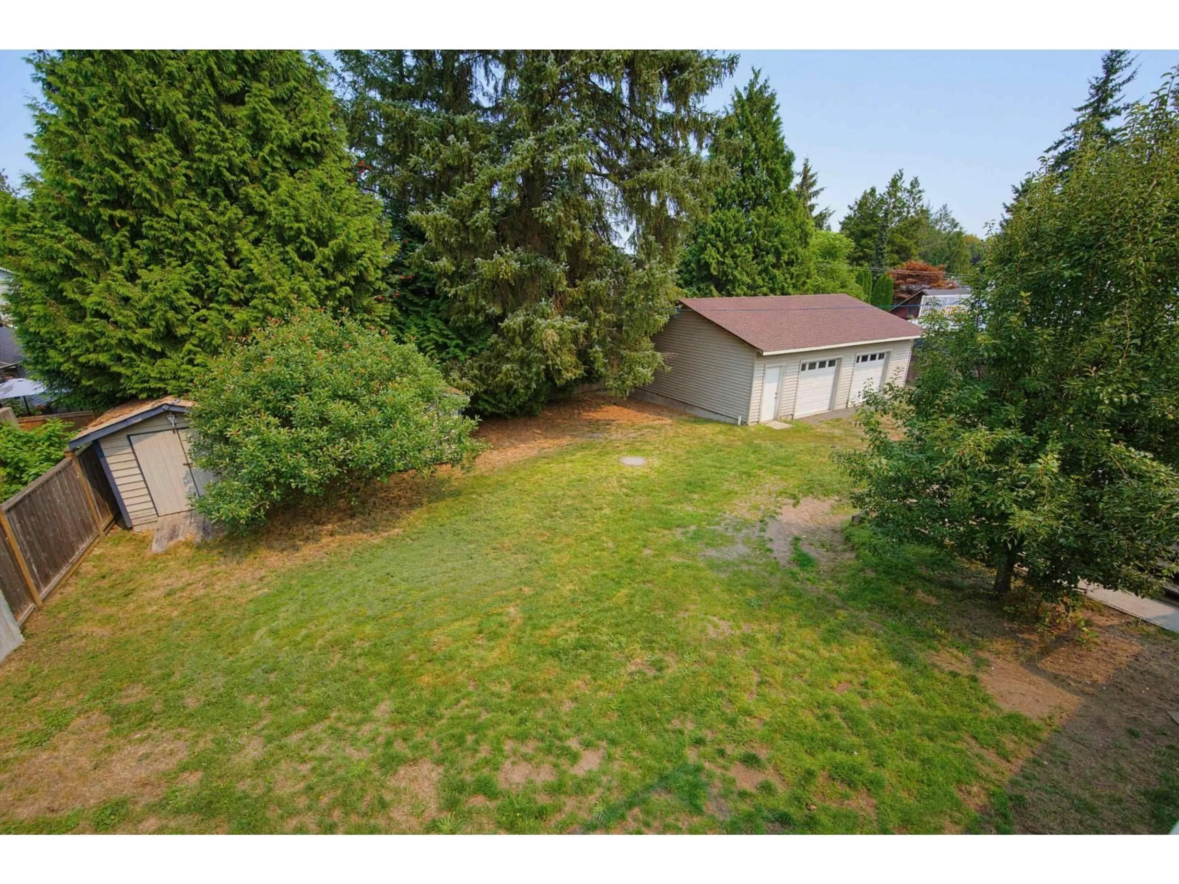 A pic from outside/outdoor area/front of a property/back of a property/a pic from drone, forest/trees view for 19671 49 AVENUE, Langley British Columbia V3A3R2